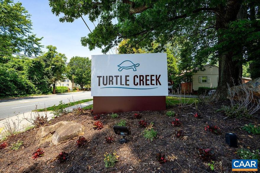 This well located 1-bedroom Turtle Creek condo is ready for its next owner's vision. It includes an additional room that can serve as a guest space, home office, or den. The spacious living room features a wood-burning fireplace and opens onto a private balcony with additional storage. The balcony overlooks greenery and a community pool. Turtle Creek amenities include two tennis courts, gym facilities, and two pools. The location can't be beat! Walking distance to shops, restaurants, and the movie theater at Stonefield. Just minutes from downtown, UVA, airport, NGIC and 29 North.,Fireplace in Living Room