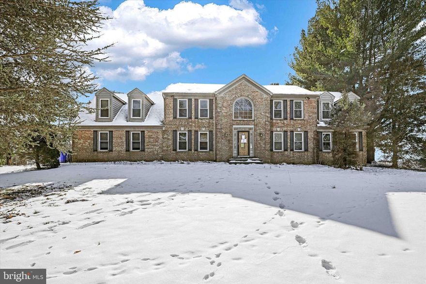 Welcome to Goshen Hunt Hills, one of the best kept secrets in Montgomery County and one where the opportunities are certainly few and far between. This grand colonial, with it’s traditional layout and spacious rooms, is sure to captivate online but wait till you experience it in person. Situated on over 2 acres at the crest of Goshen View Drive and offering almost 7000 ft.² of lavish living space you will be pleasantly pleased at how you could live in luxury in this quiet yet convenient neighborhood. Spacious bedrooms with vaulted ceilings, skylights and enormous, well appointed bathrooms on the upper level, bright and ample rooms on the main level, including a formal dining room, breakfast area with wood-burning fireplace, gourmet kitchen with meal prep area and a grand foyer with two-story ceiling welcome you to luxury living. Chair railings, wainscoting and dental molding appoint these main level, spacious rooms with convenient laundry area, half bath and oversize garage with additional storage space. The extra deep basement provides an additional bedroom, an exercise room and an enormous art studio space with plenty of storage as well. The entire package is adorned with classic, traditional detail and charm and it awaits your personal style and touch. Come and see what could be the crown jewel of this tidy and established desirable community. This rare opportunity is sure to draw a lot of interest therefore schedule your personal showing immediately.  We are committed to making your new home journey a wise decision and stellar experience.