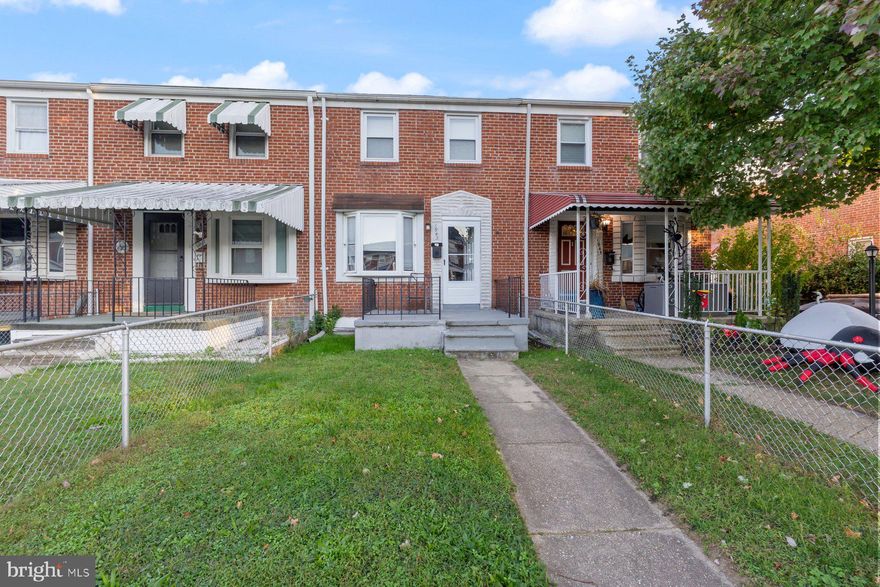 Adorable 3BR/2BA Townhome located on a quiet street in Dundalk.  Make your way through the gated front yard to the front porch and the door into your forever home.  Step inside to a home offering a crisp clean color palette, hardwood floors, and three floors of living space.  The main floor offers a spacious living room with a bow window, dining room with chair rail moldings, and kitchen. On the second floor is a sizable secondary bedroom, a large primary bedroom with a double closet, and a full bath.  The lower level is finished offering additional living space featuring the third bedroom, a full bath with walk-in shower, laundry and storage.  From the kitchen step outside to a large wood deck that overlooks the fenced yard offering green space and so many possibilities.  This home is ideal for any new homeowner and is located in close proximity to shopping, restaurants, and commuter routes.