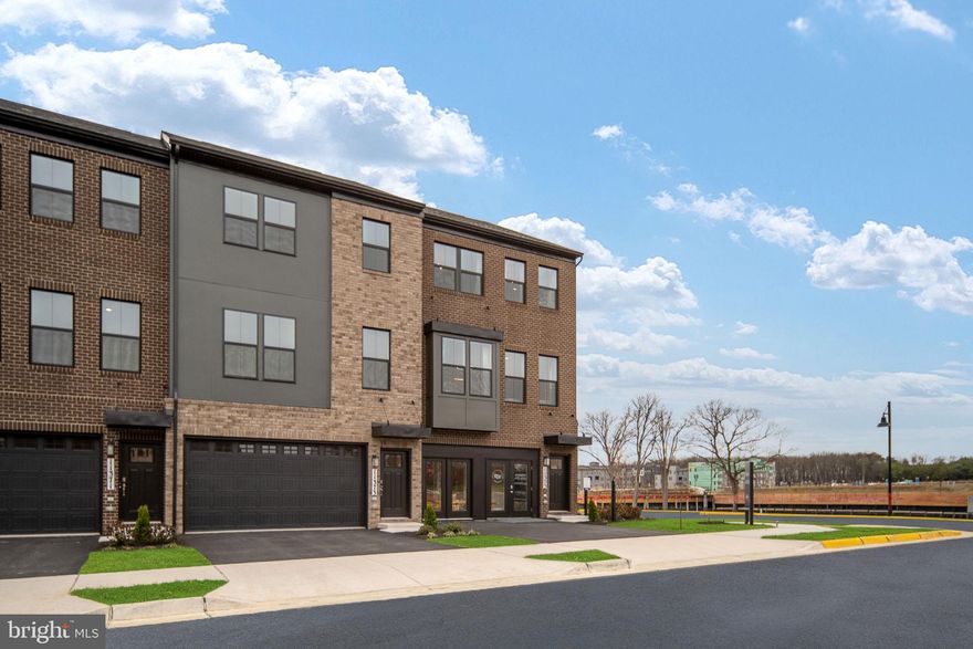 Experience D.R. Horton’s newest community, Innovation Town Center in Manassas, VA, featuring thoughtfully designed 22’-wide, three-level townhomes built for today’s lifestyle. These homes offer up to 2,270 sq. ft. with 3 upper bedrooms and a basement bedroom with full bath for your convenience. Complete with 3.5 baths, a 2-car front-load garage, a 15’x8’ rear deck, and private backyard space. Each townhome includes D.R. Horton’s signature America’s Smart Home Package and professionally curated interior design palettes. The open-concept main level showcases modern finishes and adaptable spaces perfect for working, relaxing, and entertaining. April delivery!
Up to $10,000 total closing cost assistance, ($5,000 is tied to the use of DHI Mortgage). *Photos, 3D tours, and videos are representative of plan only and may vary as built.