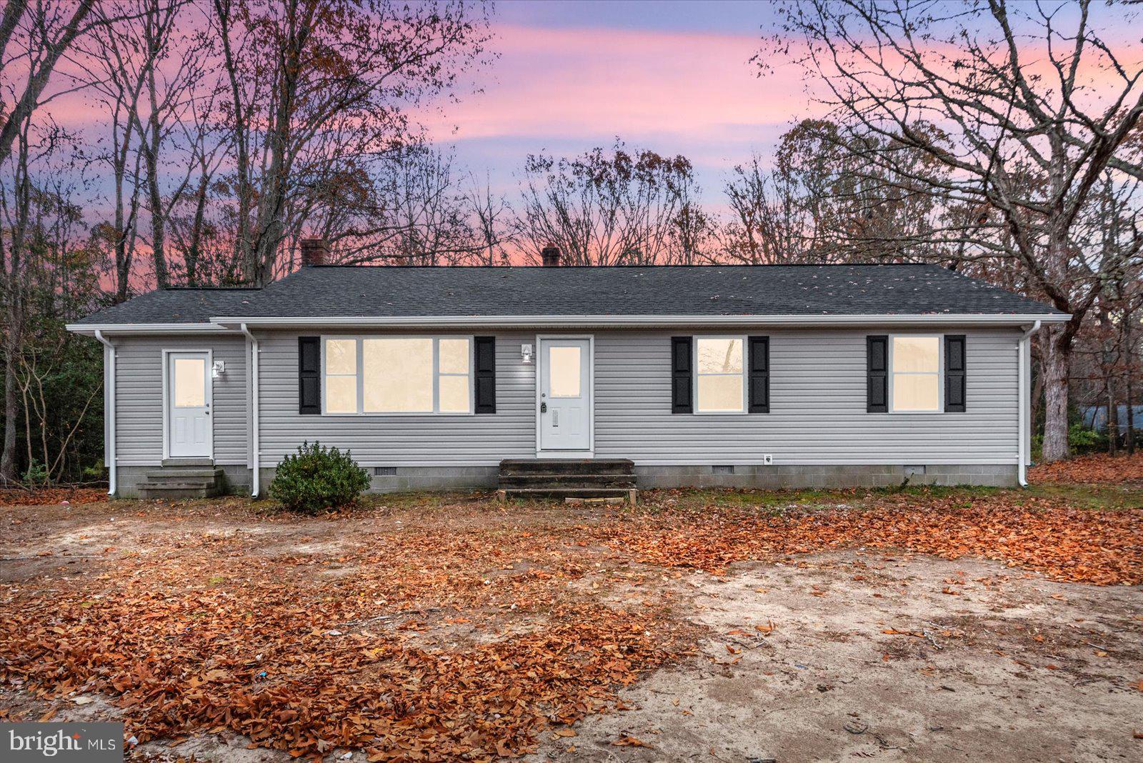 What a wonderful opportunity to own in Caret!
 This location offers rural living with  ease of access to Tappahannock, Fredericksburg, Richmond or DC especially with the VRE 29 miles away!
Don't let the age fool you - the seller has remodeled the whole home.  
As you pull up you will immediately notice the new roof, new siding, and new Low E  Argon windows! HVAC unit was completed in 2023.  

Remodeled beautifully, this spacious one level home provides you with the peace of mind that all of the work has been done for you. New flooring and paint through out along with updated bathrooms and updated 6 panel doors , It really brought this 1970's era home into modern times. You won't be disappointed. 
Entering into a  large living room  with amazing  views of wildlife and full of natural light coming  in through the new windows sets the tone for the whole remodel. 
The large kitchen has a peninsula for dining and storage. There is  plenty of room for a table and chairs in their as well. Beautiful cabinet, counter and flooring color combination. 
 Off the kitchen is an office space that has a separate front entrance . This space offers many possibilities - den, office, hobby room, sitting room and many more!.
Down the hall you will find a laundry room with rear exit to the new deck. 
The full bath along with two spacious secondary bedrooms. The primary suite overlooks the rear landscape of the home. These rooms have brand new carpet installed along with the updated bathroom across the hall. 
The yard is a great space for entertaining  with the trees offering a natural privacy fence.