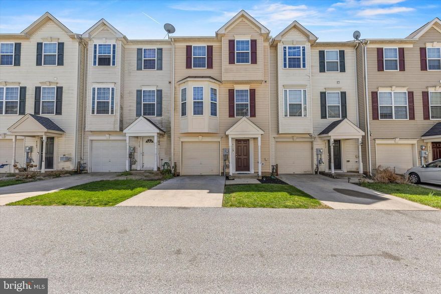 Welcome to this spacious 3-bedroom, 2.5-bath townhouse in Dover offering a functional layout across three levels with plenty of space for everyday living, entertaining, and storage. The main level features a versatile rec room with direct walk-out access to the fully fenced backyard perfect for a man cave, home gym, playroom, or extra living space. A one-car garage and dedicated laundry round out this level, keeping everything organized and out of the way. Head upstairs to the heart of the home a large, open living room with plenty of natural light, a dining area, eat-in kitchen, and a convenient half bath. Step out from this level onto your private deck. Fresh paint throughout gives the entire home a clean, move-in ready feel.
The top floor is where you'll find your large primary suite complete with a generous walk-in closet and private en-suite bathroom. Two additional bedrooms share a full hall bath, making this layout work well for families, guests, or a home office setup. Outside, the fully fenced backyard offers privacy and space to enjoy the outdoors without the maintenance of a large lot. Rounding it all out is a one-car garage with driveway parking.