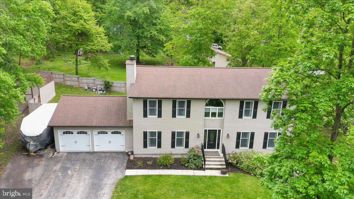 Wanting to get into your new home before the summer ends? Sellers are proposing some special incentives towards an offer! Looking for a lower interest rate? We have an incentive for that! Feeling overwhelmed about buying furniture for a 3600 sq ft home with a pool and finished basement? Let’s chat! Have your agent inquire today, because you really don’t want to go another month without enjoying the 12x24 in-ground, natural-gas heated, easy maintenance salt water pool; the large deck perfect for grilling that’s been reinforced to support a hot tub; access to the community lake (bring your kayaks!); and the opportunity to be minutes away from Liberty Mountain Resort’s ski slopes and golf course. Over the past four years, the current owners have meticulously maintained this home and remodeled it to include a stylishly updated eat-in kitchen with granite countertops; stunningly finished the walk-out basement to incorporate a 5th bedroom/home gym, full bath, kitchenette, and washer/dryer hook-up, making it suitable as an in-law suite (or AirBnB!); and tastefully created a spacious primary suite retreat with deep walk-in closet and an on-suite bathroom boasting a beautifully tiled spa-like shower with multiple shower heads. In addition to updating the kitchen, bathrooms, and floors throughout with finishes your eyes are sure to appreciate, the remodel included unseen but valuable utility upgrades as well—new HVACs and attic ductwork, new sump pump and water treatment system installations, and more! So don’t delay! Schedule a tour! Fall in love before fall! Ask your agent to inquire today!