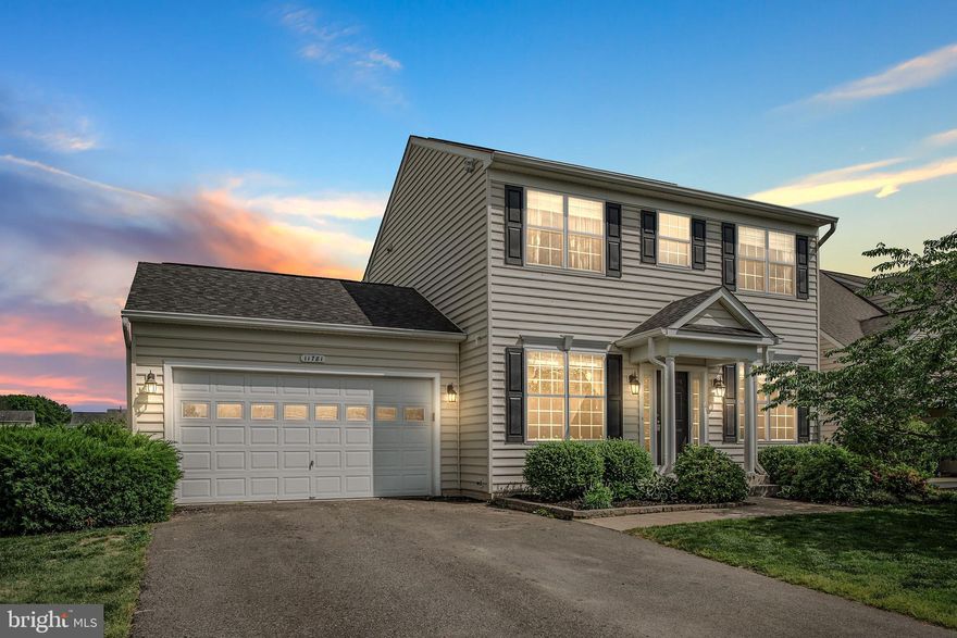 Home Sweet Home!  A Warm and Inviting Home in Hopyard Farms that backs to Pastoral Common Area.  A Great Home for Entertaining!  Enjoy Gathering in the Family Room with Fireplace and Formal Dining Room with Dramatic Tray Ceiling . The Sunny Kitchen has an Island and Plenty of Counter Space and Cabinets.  Enjoy a BBQ on the Deck Overlooking the Back Yard and Pastoral Common Area.  The Master Suite  is a Spacious Retreat with Walk In Closet and En Suite Bath.   There are Two Additional Spacious Bedrooms, an Additional Full Bath and Laundry Room for Convenience on the Upper Level.  The Lower Level Walk Out  Basement has a Recreation Room that is the Perfect Space to Catch the Big Game with Friends, a Full Bath, Craft/Game Room and Storage Space Offer More Room to Play.  It is Plumbed for a Wet Bar Too!  The Community Offers Swimming, Tennis, a Party Room, a Boat Launch, Fitness Center and Walking Trails.