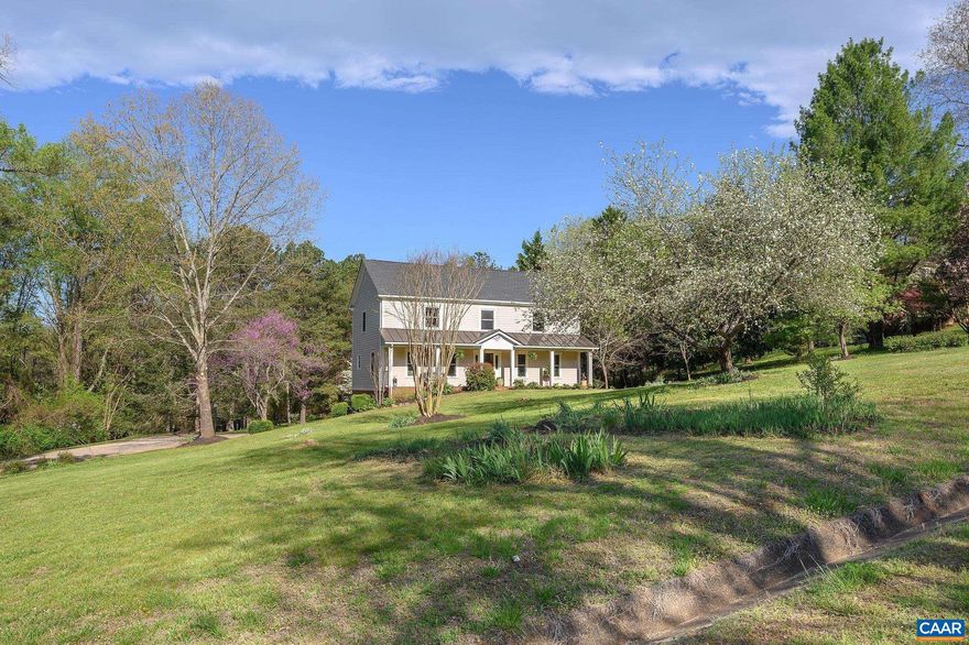 Welcoming, renovated home in Ivy?s popular Holkham neighborhood! The home is beautifully sited on a 2.5-acre picturesque parcel, adjacent to community common area with 40 acres of walking trails & streams. It has been well-loved and transformed by interior and exterior improvements; a comprehensively remodeled chef?s kitchen (soapstone, shiplap, custom tile), spa-like Primary bath, mudroom w/ custom built-in and new flooring, hardware & lighting throughout. The 5 BR, 3.5 BA home is completely move-in ready and checks all the boxes- large bedrooms, updated baths, open family room/kitchen living area and formal LR & DR too, great terrace level rec room, wood burning FP & closet systems for storage. All major systems replaced including new Windows, Roof, Siding (HardiePlank), plumbing and HVAC. Outdoor living spaces for gathering & entertaining abound- from the covered front porch to a fabulous screened-in porch with vaulted ceiling, skylights, and metal roof overlooking private, spacious rear yard to rear patio and fire pit. This exceptional neighborhood is active, welcoming and has a genuine sense of community. A short stroll to the Blue Ridge Swim Club and nearby Ivy neighborhoods and just 3 minutes to Ivy Elementary.,Glass Front Cabinets,Painted Cabinets,Soapstone Counter,White Cabinets,Fireplace in Family Room,Fireplace in Rec Room