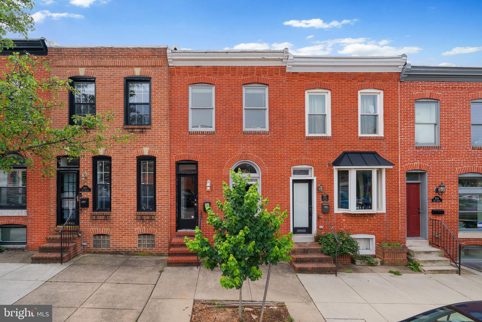Tucked away on a quiet block in the heart of Canton, this beautiful rowhome offers the perfect balance of charm, space, and city living. From the moment you step inside, you're greeted by an airy open floor plan, warm hardwood floors, and a striking blend of exposed brick and sleek floating stairs—bringing both character and a contemporary edge. The main level is a true gathering space, with a generous great room that flows effortlessly into a thoughtfully laid-out kitchen. Granite countertops, ample cabinetry, and a versatile nook—perfect for a home office or pantry—make this kitchen as functional as it is inviting. Out back, a fenced patio offers privacy and space for relaxing or entertaining. Upstairs, two well-sized bedrooms share a spacious full bath, complete with a double vanity and room to move. The finished basement adds even more flexibility, featuring a private third bedroom, a full bathroom, laundry area, bonus room, and extra storage. ***The second floor rear deck is perfectly positioned to add a set of steps up to a rooftop deck to enjoy the incredible city views!***Just blocks from the shops, restaurants, and the lively Canton Waterfront, this home gives you the best of Baltimore living—peaceful when you need it, and vibrant just around the corner. Your next chapter could begin right here. *If you want to take advantage of a guaranteed 1% lower 30 year fixed interest rate for 12 months -OR- *up to $6k in closing help, you just have to connect with Zach at Rocket Mortgage. I will share his contact. No tricks or gimmicks!...It's real money in your pocket!