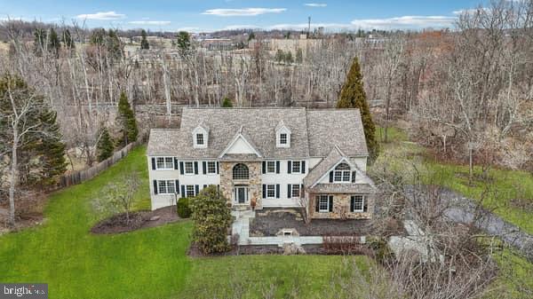 THE BROKERS OPEN SCHEDULED FOR 1/21/25 is cancelled due to the weather.
Prepare to Fall in Love with 12 Kashmir Drive! Nestled in the picturesque and highly sought-after town of Thornton, this stunning home is a masterpiece of comfort and elegance. Perfectly situated on a serene 2.2-acre lot at the end of a private cul-de-sac of just eight homes, this property offers unmatched tranquility and charm. As you approach, you'll be captivated by the most beautiful, Cherry Blossom trees lining the driveway, and by the secluded and breathtaking backyard oasis, the perfect retreat for relaxation or entertaining. Upon entering the grand two-story foyer with its sweeping staircase, you'll discover the thoughtfully designed layout. To the left of the foyer, a formal living room welcomes guests, while to the right, a bright and spacious office with French doors offers the perfect space to work or unwind. The updated powder room and an elegant formal dining room add to the allure of the main level. Just off the dining room, a cheerful solarium with tile flooring invites natural light and provides access to the expansive wrap-around Trex deck. The heart of this home is the gourmet kitchen, a culinary dream featuring a brand-new Viking 5-burner gas stove with oven, Miele steamer and convection ovens, a built-in refrigerator, a double sink with garbage disposal, and an exquisite Devon Tile backsplash and mural. An oversized island, ample counter space, and a convenient desk make this space ideal for cooking, baking, or hosting gatherings. Gleaming Brazilian Cherry wood floors flow through the kitchen and adjoining spaces, adding warmth and elegance. Adjacent to the kitchen, you'll find a spacious pantry and laundry room with access to the oversized three-car garage, equipped with two Tesla charging outlets. The family room, with its soaring two-story vaulted ceiling, cozy carpeting, stone accent wall, and wood-burning fireplace, is the perfect setting for family movie nights or intimate evenings. A secondary staircase in the family room leads to the upper levels. The second floor offers a spectacular layout, including a luxurious primary suite with a sitting room, an expansive walk-in closet, and a spa-like bath featuring marble and Devon ceramic tiles, a jacuzzi tub, a skylit shower, and a private toilet room. Additional bedrooms include a spacious suite with an adjoining sunlit bonus room, a Jack-and-Jill bathroom, and a fourth bedroom with access to the hall bath. The third floor is a true showstopper, with a large finished room that can serve as a media room, fifth bedroom, or private guest suite, complete with a full bath and generous storage. Outdoor living is a dream on the expansive wrap-around deck, perfect for summer barbecues or quiet mornings surrounded by nature. The side yard includes three raised vegetable boxes, ready for spring planting. The enormous walkout basement is plumbed for a bathroom, offering endless possibilities for customization. This home is equipped with three heating and cooling units for year-round comfort. Conveniently located just minutes from major roadways, shopping, and top-rated Thornbury Township schools, this property blends modern convenience with a sense of historic charm unique to Thornton. Don’t miss the chance to own your slice of heaven and create lifelong memories in this remarkable home. Schedule your private tour today!