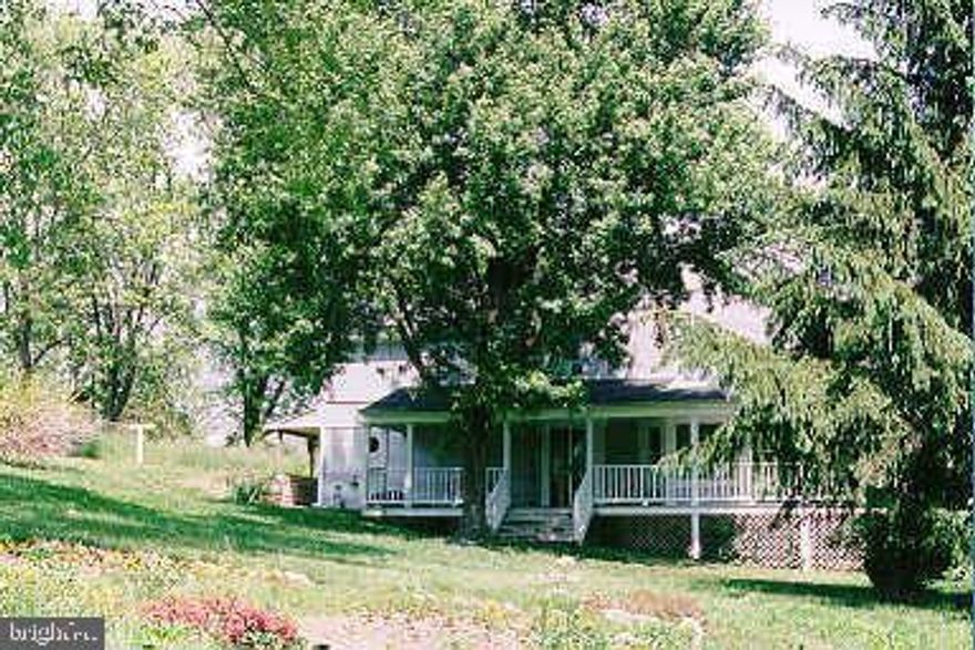 ***FIXER UPPER 
BEING SOLD AS- IS
LARGE RURAL HOME FEATURES POCKET CEILINGS, CHAIR RAILS, MODERN COUNTRY KITCHEN, WRAP AROUND PORCH, 2ND FLOOR DECK, NEW ROOF