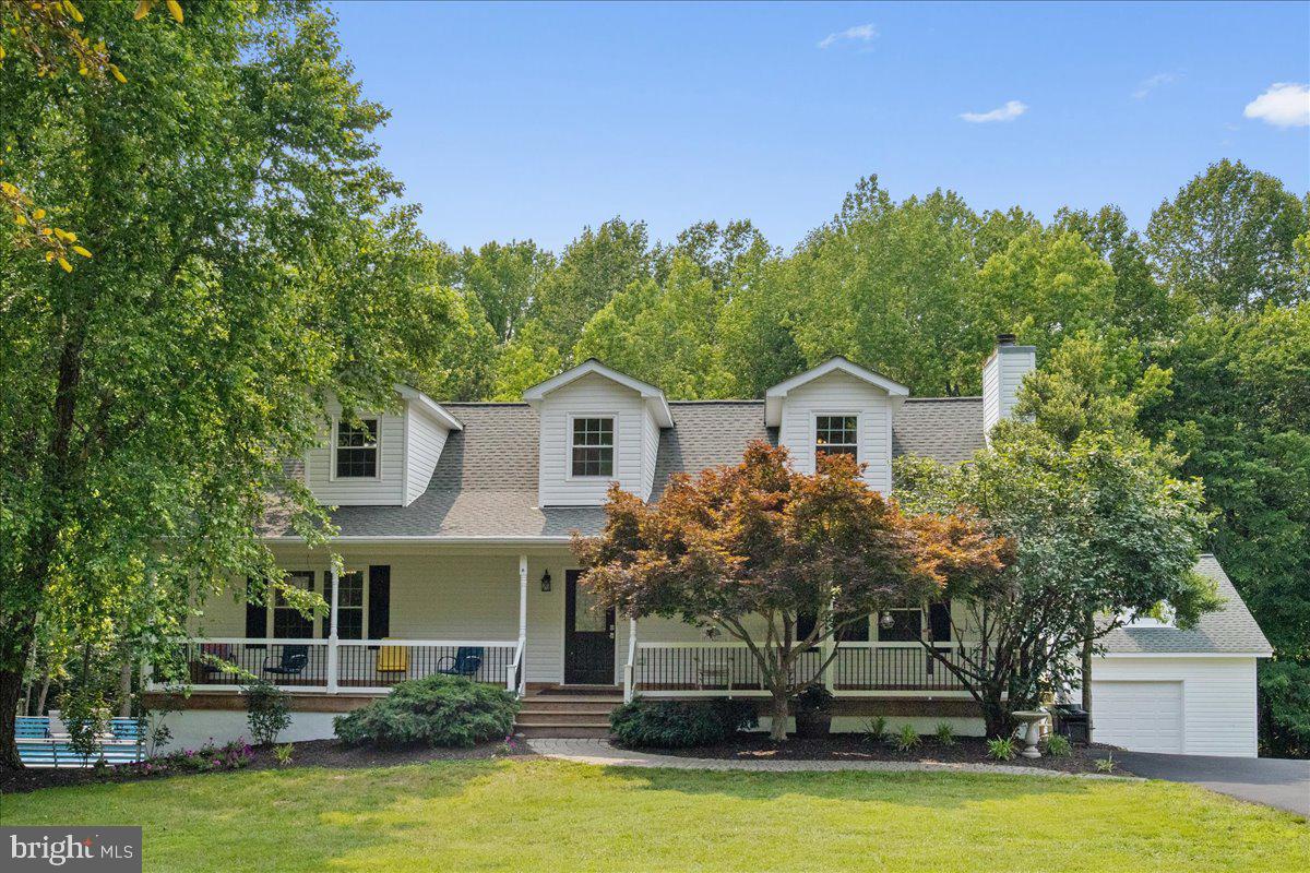 This home feels like forever; nestled at the end of a peaceful road, this impeccably maintained 4-bedroom, 3.5-bathroom home offers the perfect blend of comfort, privacy, and nature. Situated on 2.5 acres, the property backs to over 600 acres of farmland. Outside, enjoy approximately 1.5 acres of open yard space, and approximately 1 acre of serene wooded landscape with a peaceful creek, and an idyllic setting that feels like your own personal retreat.
Inside the Home:
The current owners have thoughtfully updated this home with the intention of it being their forever home, ensuring that every detail reflects their commitment to quality and long-term comfort. The spacious interior boasts gorgeous Bellawood hardwood floors (installed in 2022), updated windows and doors (2019), and a fully renovated kitchen featuring sleek quartz countertops, new appliances (2022), and custom cabinetry. Bathrooms on the main level refreshed The home offers a versatile layout with two bedrooms and two bathrooms on the main level, and two more spacious bedrooms upstairs with a full bathroom making it perfect for multigenerational living or hosting guests.
These bedrooms are equipped with their own split unit HVAC systems for added comfortability. The finished basement includes a large open living area, a half bathroom, and a bonus room with a closet—ideal for an additional bedroom, home office, or gym. The laundry room was recently updated as well with convenient cabinetry and counters!
Outdoor Features:
A spacious rear deck with a gazebo and metal roof, perfect for outdoor entertaining or enjoying the serene surroundings. A covered front porch, ideal for relaxing with a morning coffee or evening sunset. A private pool with a silver & copper filtration system—no chemicals required for easy maintenance. A detached 2-car garage with a loft storage area for all your tools, equipment, or extra belongings. A large metal building with a concrete floor, offering ample storage or workspace. An additional storage shed, providing even more space for outdoor equipment or supplies. This home also provides security with a pre-wired home generator with coverage for 10 essential circuits, ensuring you're always prepared.
This home seamlessly combines indoor and outdoor luxuries and amenities while still being just minutes from local spots and highly rated schools. The attention to detail and thoughtful updates make this home move-in ready for those who value comfort and long-term investment. Don’t miss the chance to make this serene property your own!