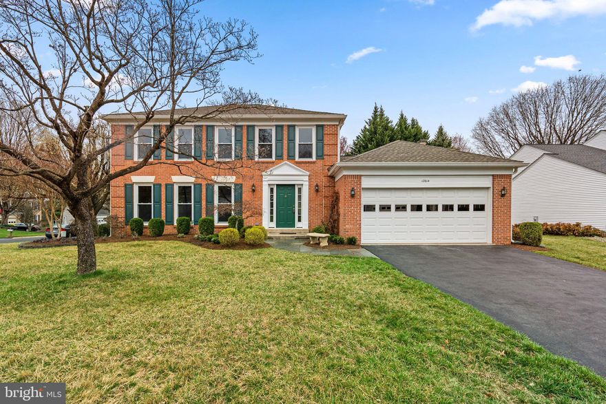 Welcome to this beautifully maintained Pulte-built Madison model in the sought-after Potomac Chase community. This 4-bedroom, 3.5-bathroom home offers a perfect blend of classic elegance and modern convenience. Step inside to a gracious foyer with crown molding, a chair rail, and hardwood floors that lead to the expansive living and dining rooms, both filled with natural light. The kitchen is a chef’s dream, featuring custom cherry cabinetry, granite countertops, stainless steel appliances, a pull-out pantry, and under-cabinet lighting. The sun-filled breakfast room with a bay window and custom blinds provides a cozy spot for morning coffee. The inviting family room open to the kitchen offers recessed lighting, a wood-burning fireplace with a brick surround, and double sliding doors that open to a flagstone patio—ideal for indoor-outdoor living. 

Upstairs, the sunlit primary suite serves as a private retreat with a large walk-in closet and a spa-inspired ensuite bath featuring a double vanity with granite countertops, a Kohler jetted tub/shower combo, and elegant ceramic tile flooring. Three additional spacious bedrooms with backyard views, double closets, and new carpeting share a well-appointed hall bathroom with a vanity and tub/shower combo. A hall linen closet provides extra storage.

The fully finished lower level offers endless possibilities with a large recreation room, a private office/den, and a full bathroom with a tub/shower combo. A walk-in storage/utility room houses a Carrier furnace (2016) and a ProLine commercial-grade state water heater (2023). Additional upgrades include a new roof (2021), replaced windows (2007), a kitchen renovation (2008), and a primary bath renovation (2011). With its timeless charm, modern updates, and unbeatable location, this home is a true Potomac Chase gem. Don’t miss the opportunity to make it yours—schedule your private tour today!