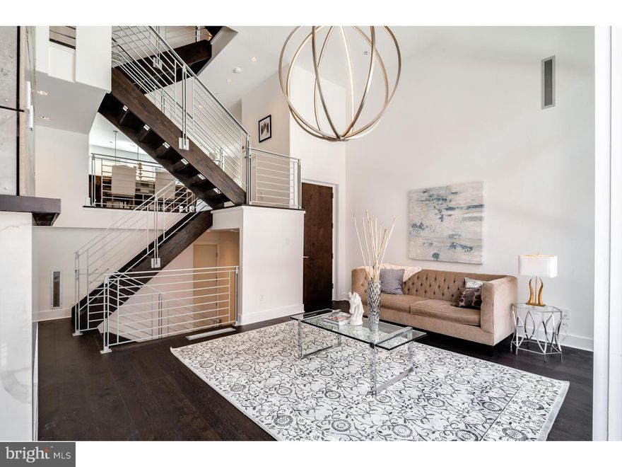 Kater Court Townhomes. Stunning NEW Construction homes with ELEVATORS, 2-CAR Garages, (5) outdoor spaces and 4000 square feet of living space! Visit our model home. Kater Court boasts 5 bedrooms plus two dens, 3.5 bathrooms and amazing custom finishes throughout. There are 6 foot long and 8 inch wide hardwood flooring planks throughout, 9-15ft ceiling heights, interior iron railing system, double roof deck! large deck off of kitchen, 8ft doors throughout, amazing natural light and custom California closets. Gorgeous European kitchen boasts cabinets imported from Spain, Wolf, Subzero, Miele and Viking appliances, rare stone countertops and designer fixtures. Finished basement, fireplace, spa-like bathrooms, 8ft windows, amazing city views, green roof, 10 year tax abatement, Smart Home system... the list doesn't end! This city home sits in a development in the heart of Center City, one block from Avenue of the Arts, and convenient to everything the city has to offer! Only one left on Bainbridge Street! prices will be increasing....