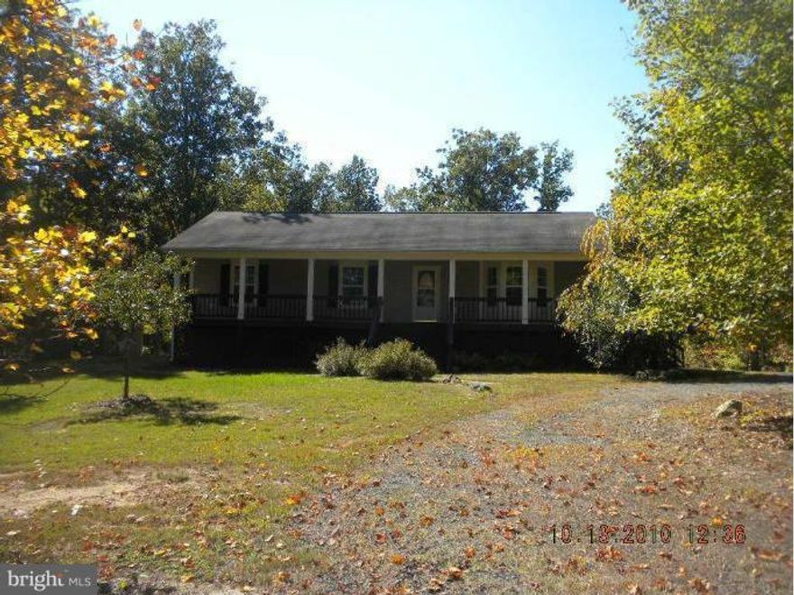 VERY NICE RANCHER ON 3.75 ACRES.BRING YOUR CAR ENTHUSIAST OR ANIMAL LOVERS TO SEE THIS WONDERFUL HOME. LARGE DETACHED 2+ BAY GARAGE,3 BEDROOMS,2 FULL BATHS,FINISHED BASEMENT,LAMINATE FLOORS,CHAIR RAIL,CROWN MOLDING,LARGE KITCHEN FOR ALL OF YOUR ENTERTAINING NEEDS.FRONT PORCH, REAR DECK,NEW HVAC SYSTEM & HOT WATER HEATER.2 VERY LARGE ROOMS IN THE BASEMENT AS WELL AS THE LARGE REC ROOM W/FIRE PLC.