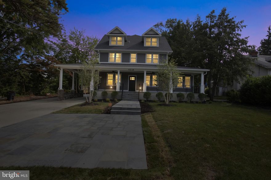 WOW!! THIS IS YOUR NEW FOREVER HOME.   One-of-a-kind, multi-generational 6 bed 6.5 bath colonial in the heart of Kensington which sits on a half-acre lot.   This property has it all!!    4 finished levels over 6,800 Square feet of total finished living area and over 5600 above grade.
The main level offers a rare second master suite with a walk-in closet, a large full bathroom with heated floors, a double sink, and custom tile.  Across from this bedroom, you will open barn doors that lead into a relaxing sunroom equipped with tons of natural light.  As you walk towards the back of the main level you will pass the living room, half bathroom with custom finishes, into an open modern kitchen with high-end stainless-steel Appliances, gorgeous soft close cabinets, an extended island with quartz countertops, a wooden range hood, huge walk-in butlerâs pantry with additional cabinets, and beverage fridge.   The Kitchen is positioned right across the large family room which entertains a gas fireplace, wiring for the large TV, recess lighting, coffered ceiling, and two large French doors that lead to the patio.   There are approved plans for a nice screened-in porch as well.   There is a rear entry mudroom that you would use to enter which has a custom cubby with a bench, hooks, and closet space. 
The second level boasts of 4 total bedrooms and 3 full bathrooms.  THIS MASTER SUITE is AMAZING!!  Spacious room with plenty of natural light, sitting area, butlerâs pantry, wired for TV, coffee maker, and beverage fridge.   Three total closets, 2 normal wall closets, and a HUGE custom walk-in closet with built-ins, and electrical outlets.   The ceiling offers distinctive lighting that surrounds the entire room.   The luxury master bathroom has it all, double showers, a standalone tub, separate vanities, elegant fixtures, LED no Fog Mirrors, and storage.    The 2nd bedroom is a Princess Suite with a beautiful independent full bath and walk-in closet.   The 3rd and 4th bedrooms are a nice size and share a unique Jack and Jill full Bathroom.   This level encompasses the laundry room and hallway storage.
You walk up to a 3rd third level which has some of the original wood exposed in the ceiling and upgraded sconce lighting.   Great space to use for a rec room or play area.  As you walk forward, will find another large bedroom with its own gorgeous full bathroom with a frameless shower.  
The Basement has an enormous recreation room, wired for 3 flat screens, upscale L-shaped bar with a contemporary design, soft close cabinetry, fixtures, space for built-in fridge, a drawer microwave, and dishwasher.   The builder installed a wine cellar that has its own temperature controls to keep your wine perfectly leveled.  You will discover another full bathroom with custom textured tile and upscaled fixtures.   This basement does have a large french door walk up into the backyard.
This house has engineered hardwood flooring on the main level and bedroom level, the basement has waterproof LVT floors, and the 3rd floor has new carpet. Tons of windows and natural light throughout the house.  All bathrooms are tastefully decorated. Beautiful trim package throughout the house. High-end touches and fixtures throughout this gorgeous homeâ¦one of its kind.
Outside you will find a beautiful front porch with ceiling fans and recess lights. Lush green lawn with tall trees for privacy. Long driveway with a turnaround leading to 2 car garage ready to be built with foundation and slab. Plans approved for screened porch outside the family room. A large backyard with a privacy fence and unlimited potentialâ¦let your imagination go wild.  Don't forget to check out the virtual tour.