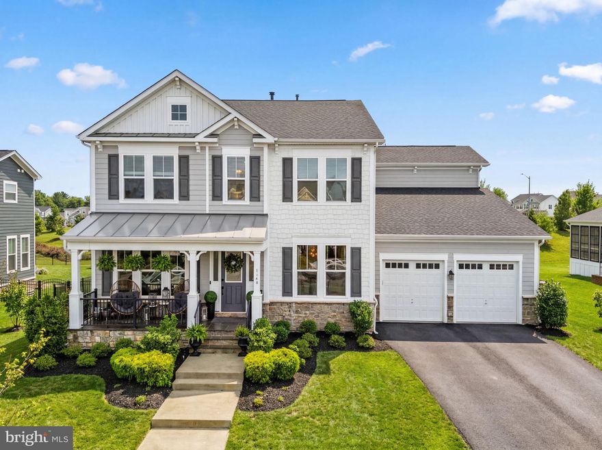 Welcome to this stunning Belmont model by Van Metre Homes, ideally situated in the highly sought-after Meadowbrook Farm community. Just minutes from historic downtown Leesburg, this exceptional residence offers the perfect blend of luxury, comfort, and convenience in the heart of Loudoun County.
Boasting 5 bedrooms and 4.5 bathrooms, this beautifully designed home impresses from the moment you arrive with its charming flagstone front porch and pristine curb appeal. The fully fenced, level backyard is an entertainer’s dream, featuring elegant hardscaping and two pergolas that create multiple outdoor living spaces for relaxing or hosting gatherings.
Inside, the main level showcases a bright, open floor plan centered around a gourmet kitchen with high-end appliances, quartz countertops, and a large center island. The adjacent living area features a striking gas fireplace and refined design details throughout. A formal dining room with custom wall paneling adds sophistication, while the private office with built-ins provides an ideal work-from-home retreat.
A versatile transitional room on the main level, currently used as a golf simulation space, offers endless possibilities as an additional 6th bedroom, office, or flex room.
Upstairs, you’ll find four generously sized bedrooms and a convenient upper-level laundry room. The primary suite is truly extraordinary, reminiscent of a private Tuscan villa, featuring elegant lime wash walls, exposed beams, and a luxurious spa-inspired bath. The upper level also includes a private en-suite guest bedroom and a Jack-and-Jill bathroom serving the additional bedrooms.
The finished lower level expands the home’s living space with a large bedroom, walk-in closet, full bathroom, and an expansive recreation area. A dedicated gym space with professional mat flooring and fully mirrored walls makes this level perfect for fitness enthusiasts.
Step outside to an exceptional outdoor living space designed for both entertaining and everyday enjoyment. A stunning accordion door seamlessly connects the interior to a beautifully crafted patio featuring dual pergolas, fire pit, and thoughtfully designed gathering areas. With approximately $60,000 invested, this space offers a true extension of the home. The flat, fully usable backyard provides the perfect opportunity for a future pool, creating endless potential to customize your private outdoor retreat.
With its thoughtful layout, upscale finishes, and prime location near shopping, dining, commuter routes, and the charm of downtown Leesburg, this home offers an exceptional lifestyle in one of Loudoun County’s most desirable neighborhoods.