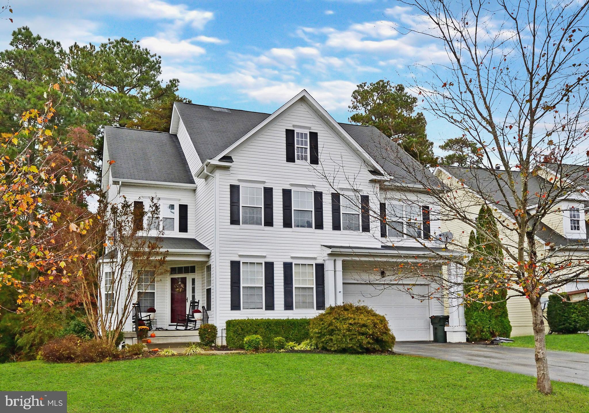 Located in the sought-out Wildewood Community....This gorgeous home awaits you! 5 spacious bedrooms, 4.5 baths. Gourmet Kitchen with island, five burner gas cooktop, granite counter-tops, 42" cherry cabinets, under cabinet lighting, backsplash, pantry, hardwood floors and more. Family Room with gas fireplace. Nice open layout for entertaining guests. Owner's Suite with large bedroom, 2 walk-in closets, and en-suite bathroom. Spacious secondary bedrooms. The second bedroom has an en-suite bathroom. Finished basement with 5th bedroom, full bath, recreational room, and storage areas. Front porch, rear patio (with firepit) and deck offer additional outside living space. In-ground sprinkler system.