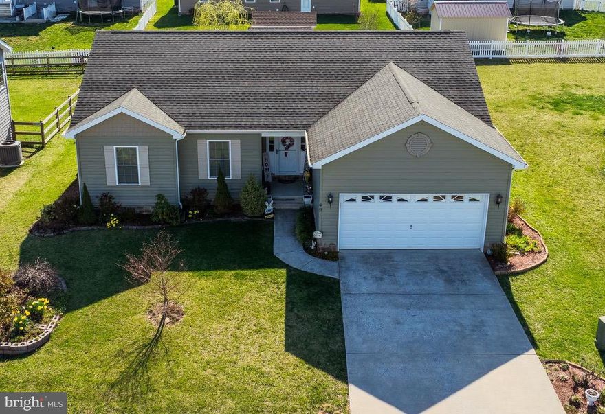 Welcome to your future home sweet home! This charming rancher nestled in a serene neighborhood offers an idyllic blend of comfort and style. Let's dive into the delightful features awaiting you:  3 Bedrooms: Perfect for those needing space for guests or a home office.   2 Bathrooms.    Embrace the spaciousness and flexibility of an open floor plan, ideal for entertaining or simply enjoying everyday living.   Enjoy the beauty of lvp flooring throughout, offering durability and easy maintenance.   Prepare culinary delights in style with granite countertops, a large kitchen island, and 42-inch cabinets providing ample storage.   The kitchen is equipped with stainless steel appliances, marrying style with functionality.   Flexibility awaits in the partially finished basement, offering additional living space or storage options.   Protect your vehicles from the elements and enjoy added storage space.   Step outside to your private oasis, ideal for outdoor dining, relaxation, or entertaining in style.  This home is the epitome of modern comfort and convenience, offering a blend of tasteful finishes and thoughtful design elements.  Located just minutes from Hedgesville Schools and local Shopping.   Don't miss the opportunity to make this your dream home.