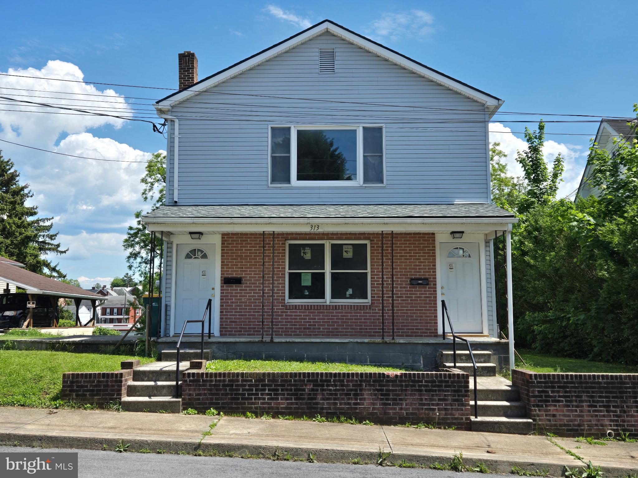 Completely Renovated down to the Studs! This exceptional 2-unit property has 1- two Bedroom & 1 - three Bedroom Apartment, and a 4-bay Detached Garage! Permitted renovations include insulation, drywall, plumbing, electric, HVAC (Heat Pump in each unit), windows, roof, bath & kitchen fixtures & cabinets, lighting, luxury vinyl tile, carpeting, doors, trim, and painting throughout! Electric is separately metered. All 4 garages are vacant. Dishwasher, stove & refrigerator included for each apartment. No electricity in the garages.