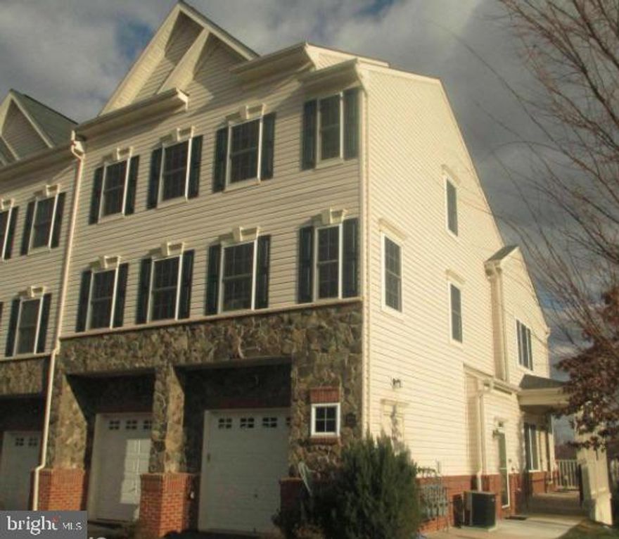 End unit townhome filled with light and tasteful upgrades - Fresh Paint and New Carpet! Stunning kitchen with gas range, stainless steel appliances and granite countertops. Hard woods and new wall-to-wall carpeting. Master bathroom with large walk-in closet, separate shower and soaking tub with custom tile work. One car garage. Located in sought after River Oaks, this home is conveniently located to I-95, Bus, VRE, Slug Lots, Potomac Mills and Potomac Town Center.  Not FHA approved.