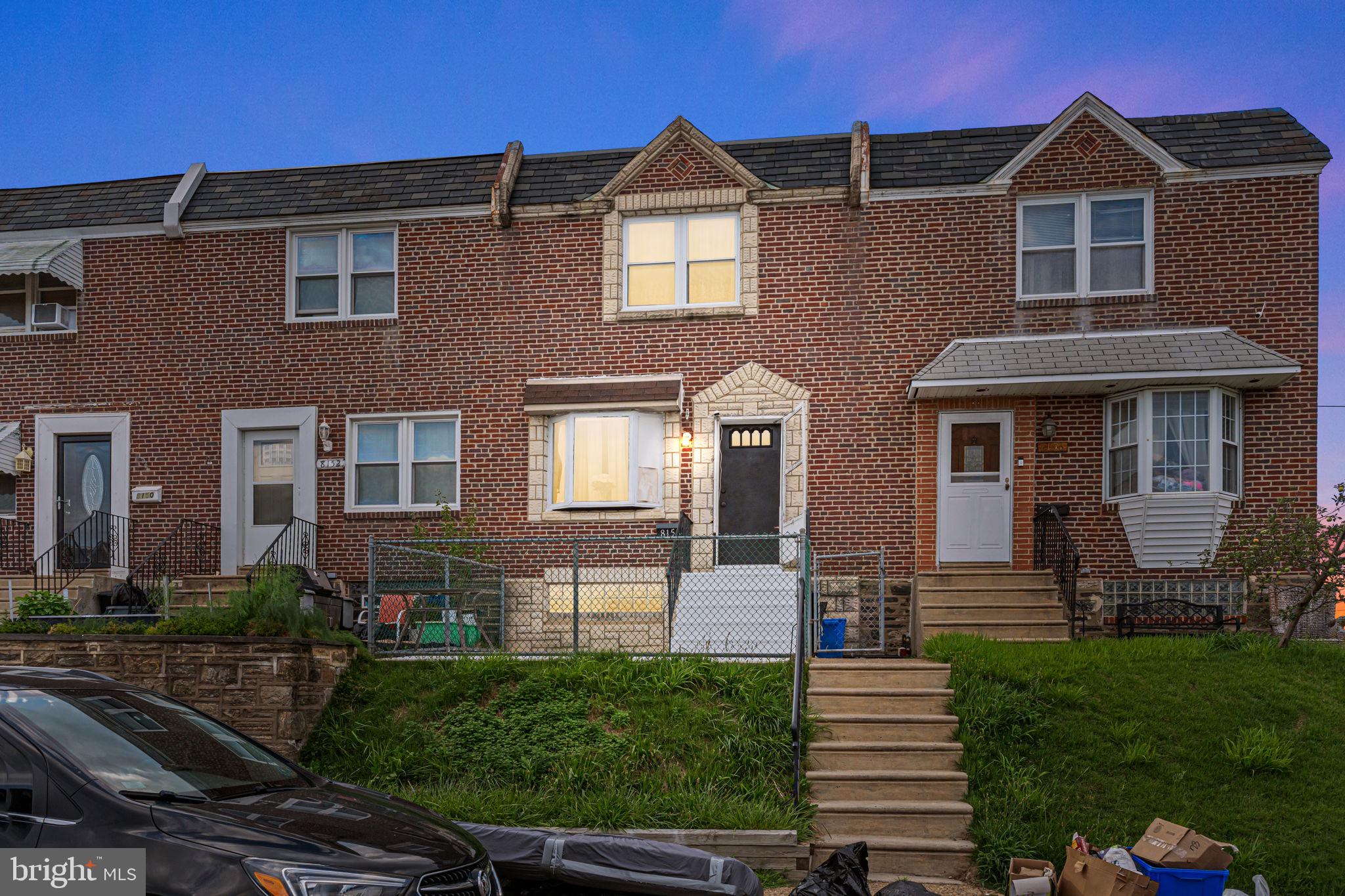 Welcome to this well maintained brick row home in the heart of the Holmesburg area of Philadelphia. It features 3 bedrooms and 2 Full baths. The entry level of the home includes the living room with a good size bay window for an outpour of natural light into the home. The floors have been updated throughout the first and second floors. The dining room has an open concept with a decent sized kitchen island counter for ample seating. The kitchen has updated light colored cabinets with gold colored hardware that compliments the back splash. The glass sliding door in the dinning /kitchen leads out to the wooden deck. This is the perfect area to host summer cookout or to make smores on a cold winter night. This home is equipped with central air conditioning and ceiling fans. The lower level of the home includes one full bathroom with ceramic tiles throughout. The Laundry area with washer and dryer tucked away perfectly to save space. This basement can be used for countless ways; entertainment, a play room or even the perfect office area for someone that works from home. Conveniently located near schools, shops parks, public transit and major highways.