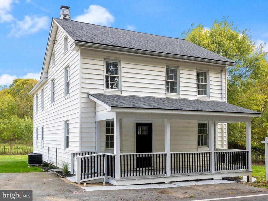 Beautifully renovated oversized farmhouse nestled in the heart of Middletown Valley, where timeless character meets modern comfort. This charming 3-bedroom, 2-full-bath home is truly move-in ready and filled with warmth and natural light.   On the main floor you will find a spacious open concept living area with custom fireplace, while the updated kitchen showcases SS appliances/quartz countertops/white shaker cabinets/ a custom tiled backsplash and lots of countertop space for entertaining.  On the 2nd floor there are 3 large bedrooms, a laundry room, a large full bath with custom tile work and owners suite with a access to a private rear balcony as well as access to the full walk up attic!  Outside you can relax on the covered front porch and take in the peaceful surroundings, or entertain in the generous yard framed by scenic valley views. A standout feature is the two-story “man cave” with a workshop below and an upper-level living space—ideal for conversion into a private studio, home office, or creative retreat.  On top of all this there is a brand new roof, new furnace and new AC!