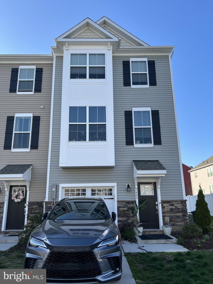 Welcome !!!! Here’s your opportunity to own this like new 4 bedroom 3.5 bath cornerstone of the community. This lovely end unit townhome has the bells and whistles the builder had to offer. Enjoy the expanded square footage with the double bay windows and three level extension. Enjoy the one car garage, a bedroom and a full bath on the ground level. Upstairs on the main level enjoy the powder room, modern kitchen with pendulum lighting, like new appliances, beautiful cabinetry and plenty of storage space so perfect for entertaining. Partake in the natural lighting this home has to offer with a plethora of windows, cozy up with fireplace, and relax with deck off the great room. Finally make your way up to the third level with the owner’s suite eloquently constructed with a vaulted ceiling, spacious bath and large closet. Lastly, enjoy the third-floor laundry and two other bedrooms and yet another full- size bath. Words can’t fully describe this home come take a look for yourself.
