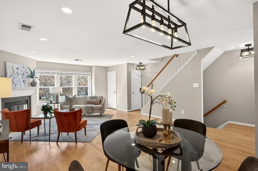 Tucked away in a quiet enclave of just 10 brick units, this beautifully updated 2 level town home delivers the best of Rosslyn living - steps from Arlington Ridge Park, historic landmarks, and the iconic Key Bridge.  Welcomed by an open floor plan and remodeled kitchen with granite countertops & backsplash that flows seamlessly into a bright living area. Enjoy smart recessed lighting, hardwood floors, abundant natural light, and the warmth of a wood burning fireplace. Two spacious upper-level bedrooms, each with updated en-suite bathrooms, primary features two vanities and generous custom closets.  A newly stained balcony offers peaceful treetop views, perfect for morning coffee or evening unwinding. Refreshed with paint and carpeting, hot water heater 3 yrs, & stackable, frontload laundry. Large, secured storage space conveys under balcony, assigned parking, and access to a community EV charging station. Celebrate summer in style - this location is just a block from stunning views of the National 4th of July fireworks. Residents enjoy a laid back sense of community - impromptu evenings around the firepit and holiday gatherings. With an incredibly low condo fee, less than one mile to 2 Metro Stations, minutes to major routes, Courthouse Farmer’s Market, and only 2 miles to Georgetown’s dining and shopping, this is a rare opportunity to own a turnkey home in one of Arlington’s most coveted pockets. Roof, trash and snow removal included in association fee.