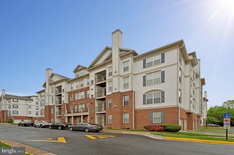 Photo of 11575 Cavalier Landing Court #301, FAIRFAX, VA 22030 (MLS # VAFX2307300)