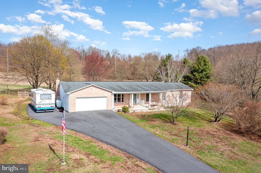 Welcome to 14 Murray Meadows Lane!! Nestled on a serene 1.2-acre lot, this beautifully maintained brick ranch offers the perfect blend of comfort, space, and elegance. Boasting 4 bedrooms and 4 full baths, this home provides plenty of room for family and guests alike. Step inside to discover brand-new flooring throughout, enhancing the bright and airy layout. The family room features an efficient propane fireplace, creating a warm and inviting atmosphere. Entertain with ease in the private dining room, which flows seamlessly into the light-filled three-seasons room—perfect for morning coffee or evening relaxation. The home features an oversized master suite, with generous closet space and private bath, offering a luxurious and flexible living arrangement. With central air and ample storage throughout, comfort and convenience are guaranteed. New! New! New! Sellers replaced the heating and cooling system,  well pump and blue tank and water heater ... so rest assured that the mechanical portion of the home is ready for years of use. Enjoy the peace and privacy of your expansive property, ideal for outdoor gatherings, gardening, or simply soaking in the natural beauty. This rare gem combines traditional charm with modern updates—don’t miss your opportunity to own a slice of paradise!
