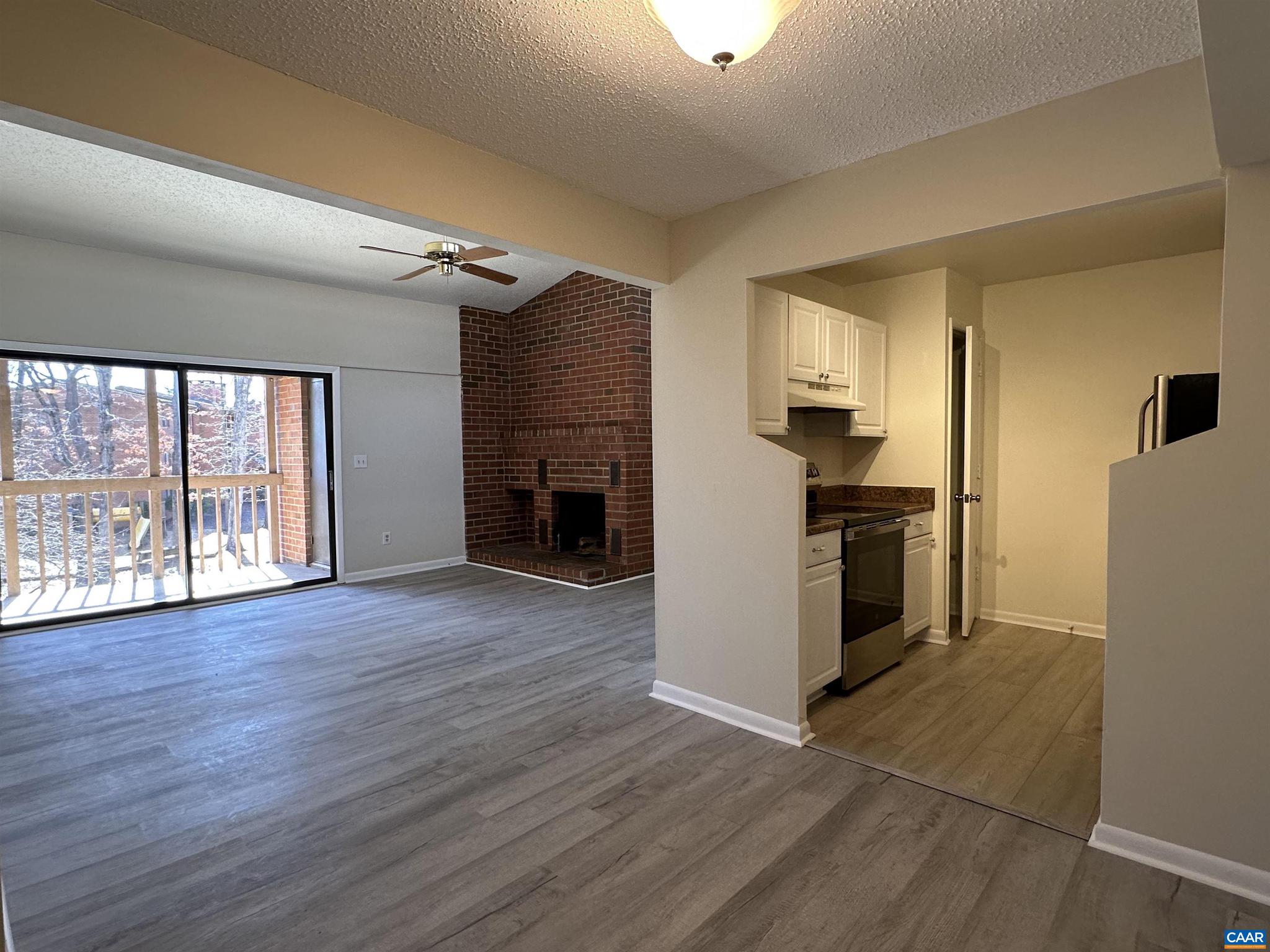 Perfect for investor! Leased through July 2026. Fantastic opportunity to purchase recently updated condo in Turtle Creek! New flooring, fresh paint, new range! Top floor with balcony and wood burning fireplace. Lots of light through glass doors in living room. Cathedral ceilings give a spacious, open feel. Kitchen has freshly painted cabinets, and primary bedroom has large, walk-in closet. Turtle Creek offers pool, clubhouse, tennis/pickleball! Perfect location just near Stonefield shopping, Trader Joe's, Whole Foods, UVA and everything Charlottesville has to offer. Turtle Creek does not allow pets.