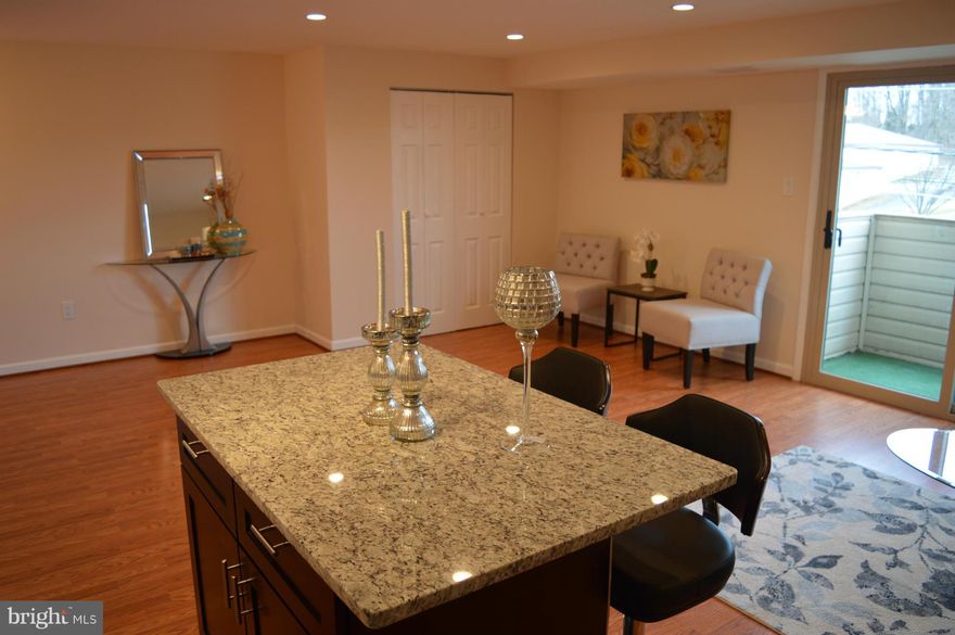 Must see this beautifully remodeled 2 bed 2 bath with laundry in unit. All new kitchen cabinets, granite counters, and stainless steel appliances. Fresh paint, new flooring throughout including new baseboards. Modern lighting throughout living room, kitchen, and bedrooms. Bathrooms have new vanities, faucets, lights, and ceramic tiles. Secure building. Conveniently close to 270. Not FHA approved.