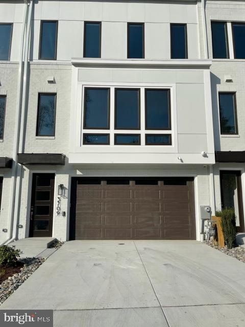 Beautiful Townhome in the Heart of Rock Creek Park. Creekside's park-side setting is private and tucked away, with views of Rock Creek Park. Less than a mile from the New Ritz Carlton Residences and 60,000 square feet of future retail being built! Creekside's Chevy Chase is convenient to transportation and amenities. The townhouse has elevators at every level, 13' ceilings in the Great Room and Rec Room/4th Bedroom, and an elegant kitchen with a waterfall island. Outdoor living/entertaining spaces include a slate patio in the backyard and an elegant outdoor deck, with refrigerator/sink and prewired for TV. The community offers miles of hiking, biking, and nature trails. Close to Congressional Country Club, Ritz Carlton Residents, Amazon Fresh Grocery, restaurants, and entertainment. Must See!!