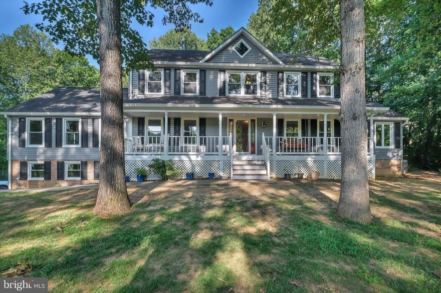 Welcome home to your own serene retreat nestled in the highly sought-after Foxmill community—one of the few neighborhoods routed to award winning schools including Colgan Sr. High with NO HOA! Perched on a spacious 1.43-acre lot, this impressive 4,849 sq ft Colonial-style home offers a perfect blend of elegance, comfort, and privacy.
Step inside from your quintessential front porch to discover four generously sized bedrooms, 2.5 bathrooms, and a host of upgrades designed to enhance everyday living. Natural light floods the interior thanks to newly installed triple-pane windows (2023) and skylights, creating a bright and airy atmosphere throughout.
The heart of the home is the stunning gourmet kitchen, complete with: stainless appliances, quartz countertops, deep drawers and custom cabinetry, gigantic center island, double wall ovens and gas range with pot filler, eat-in dining area located next to your  sliding glass door to the enclosed patio.
Adjacent to the kitchen is a formal dining room featuring elegant wainscoting and a charming bay window, ideal for gatherings and special occasions.
The spacious family room with vaulted ceilings offers the perfect setting for entertaining or cozy evenings by the fire. Need a quiet place to work? The main-level office with French doors ensures productivity and privacy. For moments of peace and inspiration, retreat to the sunroom, surrounded by windows and a door leading to the back deck, where you can unwind and enjoy nature.
Outdoor living is unmatched here with a beautifully maintained in-ground pool, perfect for summer relaxation, and a side-entry garage with under-home parking—keeping your front view car-free and picturesque.
Upstairs, the primary suite offers a spa-like escape, complete with a large walk-in closet, bright, naturally lit bathroom and spa en-suite with soaking tub and separate shower. Also upstairs is a conveniently located laundry area, eliminating the hassle of hauling clothes up and down stairs. The three additional bedrooms are all spacious, with recessed lighting throughout.
The walk-up basement is the ultimate flex space—ideal for a home gym, playroom, or a media-ready man cave—with direct access to the backyard.
Don’t miss your chance to own this unique gem in Foxmill—where luxury meets practicality and there’s no HOA to limit your freedom. Call to tour today.