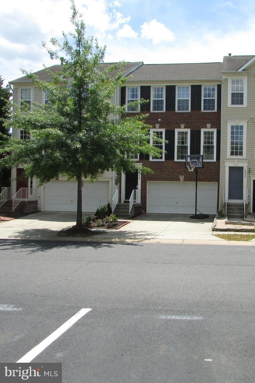 Property will be VACANT, professionally cleaned and Move-in Ready condition by 8/31/2019 !!  Three Level bump-outs! The total living area is 2448 s.f. Two car garage TH brick front, H/wood floors, New carpet upper level, and basement, Granite counter-tops, Large kitchen w/island, Master bedroom with soak -in tub and separate shower, Laundry on bedroom level, Walkout basement with spacious Rec room, Trex Deck and Patio. Close to many Amenities.