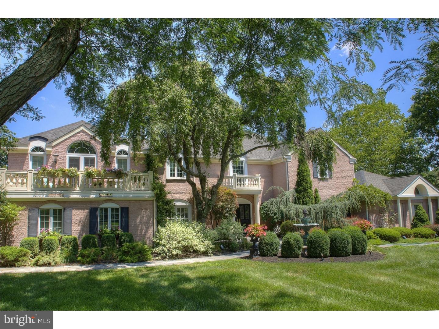 Welcome to this rare find in Bucks County. An ALL brick custom home, updated, spacious, incredibly comfortable and beautifully designed & built by Worthington Builders, fulfilling every need you can think of including in-law suite and professional office space. The pi ce de r sistance is the back yard European retreat like no other, and to top it off, it all backs to the preserved land of Honey Hollow. Absolutely perfect!! The gracious entry foyer with marble floor welcomes you into a home filled with hardwood floors, crown, chair and accent moldings, recessed lighting, high ceilings, 6+ sets of glass french doors, and storage galore. A dining room with patio access, accent columns and accent mirrors is to your left, while a large open living room with fireplace is to your right. Beyond the living room lies the exquisite office/rec room/professional suite accented with beautiful Tenistete stone gracing one wall incorporating a faux fireplace and hidden closet, while the opposing wall features beautifully arched windows and built in bookcases with the ultimate in hidden lighting. Separate doors, one for entry and the other for patio access, make this a perfect space for the work at home professional! The family room with marble fireplace, corner built-ins & access to the outdoor kitchen is also open to the gourmet indoor kitchen featuring an Aga 6 burner gas stove, professional full size side-by-side stainless steel refrigerator/freezer, farm sink, island, granite and a full wall pantry; sensational! The breakfast room overlooks the amazing outdoor oasis that truly takes your breath away. The first floor is finished with a large back hall, laundry room that doubles as a butler's pantry, and a very spacious in-law/whatever room, featuring large built in entertainment center. Upstairs, in addition to the 3 large bedrooms and updated hall bath with travertine, double sinks and large stone shower with seamless doors, is the master suite to beat all! Sitting room, enormous walk in closet spanning the length of one wall, balcony, arched mirrored doors and a luxurious marble bath retreat! Outside, beyond the stacked stone wall kitchen with BBQ, refrigerator, granite eat at bar and storage, enormous bluestone patios for entertainment, fountains, large salt water pool, cabana with TV, and pergola, you'll find a large back lawn for play, garden area and more, all backing to preserved land. This is a rare gem and an extremely comfortable home with LOW taxes!