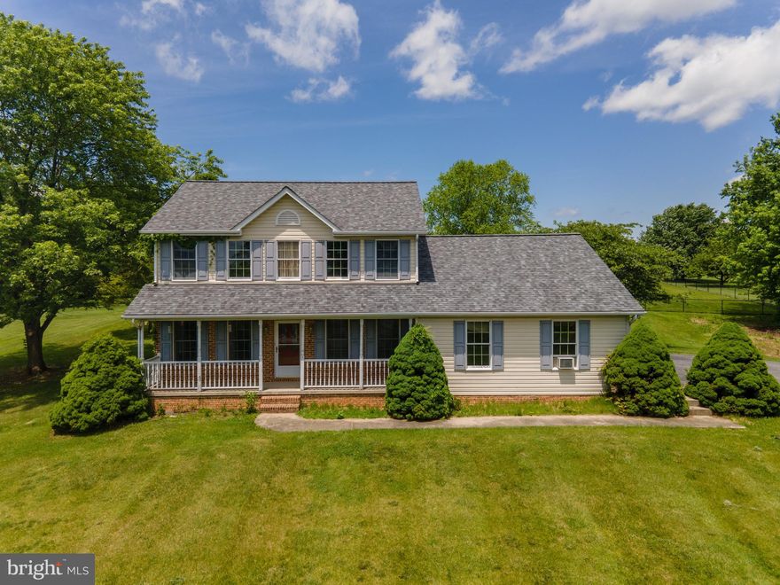 Opportunity awaits.  This spacious 2-story colonial home sits on 1.08-acres of land with mountain and pastoral views in all directions.  Enjoy the views from the full covered front porch or the rear concrete patio.  The patio is wired and ready for your hot tub.  The grounds offer mature landscaping, numerous shade trees and vast open lawns, perfect for outdoor entertaining, gardening or pets.
Step through the front entry door and you'll find a 2-story open foyer, flanked by a formal dining room and living room.  The dining room would seat 6 comfortably, making it perfect for holiday entertaining or an intimate dinner for two.  The formal living room could also double as a spacious home office with lots of natural sunlight for most of the day thanks to the Southwest direction.  Moving deeper into the home you'll find an open floor plan that combines the galley kitchen, breakfast bar, breakfast nook and family room.  The kitchen includes lots of counter space, a large pantry and large bump-out breakfast area that could seat 6.  The kitchen opens into the spacious family room which features a brick fireplace, carpeted floors and French doors to the rear patio.
The main floor also features a convenient laundry room and mud room located between the kitchen and the large 2-car garage.  Just off the laundry room is an additional room that would function as a den/study or home office.  The main floor also offers a centrally located half bath.
The 2nd floor features a loft overlook into the main floor entry foyer, 2 full bathrooms and 3 large bedrooms.  The primary bedroom features carpeted floors, two large closets, and a private full bath.
The home includes a full basement with half of it finished as a rec room.  The other half is perfect for storage, utilities or could be finished for additional living space.  The basement includes walk-out stairs to the rear yard and patio.
The home does need work and is being sold as-is.  The price reflects the work that may be needed.  This would make the perfect home to add some sweat equity into, or fix and flip for a handy profit.