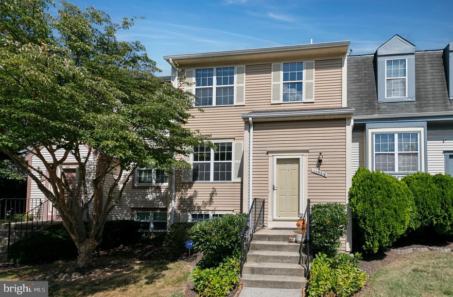 Welcome to Crimson — a well-maintained 2-bedroom, 2 full bath, 2 half bath home offering comfort, functionality, and a prime location. Inside, you'll find fresh paint, new LED recessed lighting, and updated blinds throughout, creating a bright and welcoming atmosphere. The main level features separate living and dining rooms, along with a table-space kitchen for everyday convenience. The lower level includes a versatile rec room, a separate laundry area, a half bath, and great storage options. Out back, enjoy a walkout brick patio with a small garden area — perfect for a bit of outdoor space without the upkeep.

Located just minutes from downtown Silver Spring, with easy access to major commuter routes, shopping, dining, and more. This home offers a thoughtful layout and modern updates in a truly convenient location.