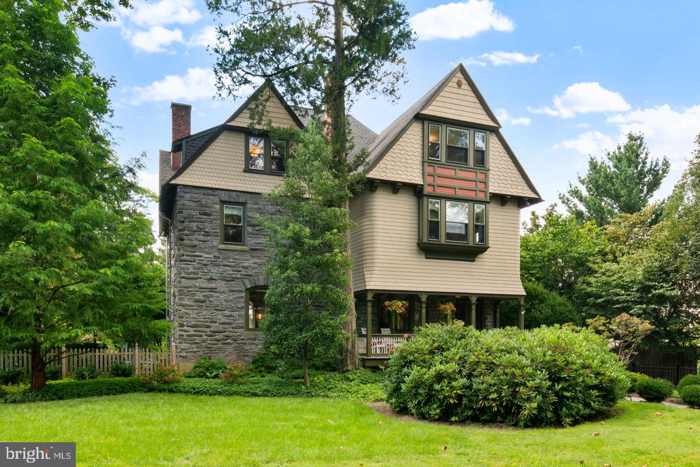 A perfect Chestnut Hill home with a most desirable location. This c. 1889 home was originally one of three homes built along with the historic St Martins-in-the-Fields. This third home from the church retains all its historic character and detail, and is recently renovated with gorgeous 21st century finishes and amenities. Yet some things never change, like the high ceilings and significant original detail, the brilliant sunshine permeating throughout, the ideally sized and situated 1/2 acre lot, and the superb location--10 minute walk to the Avenue via Gravers or Willow Grove, 10 minute walk to the Wissahickon trails through the fields along a direct path, and less than 5 minute walk to the train to Center City. The home itself and its land are amazing. The lot is a 1/2 acre of easily maintained flat lawn, trees, and landscaping; with two patios, a front porch, 2-car GARAGE (and plenty of additional driveway parking), and a ton of space to play. The exterior Queen Ann Victorian architecture is magnificent. The home includes 6 bedrooms, 5.5 baths (4 en suite), a family room and spacious office with lovely views. Gorgeous entry hall, mud room, and superb storage throughout, including the big, dry basement. 10' ceilings, Hardwood floors throughout including gorgeous random width pine floors on the 2nd and 3rd floors, and a newer oak floor on the 1st floor with walnut and maple inlay. Three fireplaces, one wood burning, one gas, and one decorative. Original moldings and other beautiful details throughout the entire home including a two-story arched window with 11 panes that is perfectly integrated with the grand, original staircase. Bay windows with window seats. This important home offers all the indoor and outdoor space you need, especially when spending more time at home. Many spaces and privacy, but also an ideal flow and wonderful volume and light. Developed in 1889 by Henry Houston and designed by G.W. & W.D. Hewitt, architects. Easy walk to Germantown Avenue, the Wissahickon trails, Springside Chestnut Hill Academy, and the historic St Martins Station on SEPTA’s Chestnut Hill West Regional Rail Line. Behind the home is the Philadelphia Cricket Club--the consummate neighbor--impeccably quiet and well-mannered, plus along with the nearby SCH, has extra security with eyes on the neighborhood.