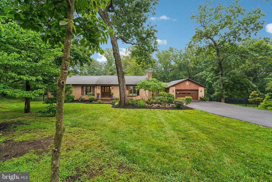 Welcome to this exceptional Ellicott City home, perfectly situated on over one acre within the highly sought-after Howard County School District. This spacious 4-bedroom, 3.5-bathroom rancher offers approximately 3,600 sq. ft. of thoughtfully designed living space with easy one-level living on the main floor. The main level features a flowing floor plan with hardwood floors, tiled foyer,  custom woodwork, an inviting eat-in kitchen boasting a new granite island, a cozy breakfast nook, and a stunning bay windows.  Enjoy the tiled enclosed breezeway for a sunroom, office area, exercise room, study.  The fully finished walk-out basement offers a private guest suite or versatile recreation space with a rec room, bedroom, flex room, full bath, laundry area, storage, Recent upgrades include a newer roof, new boiler (2023), three luxurious renovated baths, including a sauna,  new fence, new pavers that enhance the stunning outdoor living space, complete with hot tub . Commuters will appreciate the strategic location with easy access to I-95, I-295, I-70, Route 29, Route 100, Route 198, Route 216, the Baltimore-Washington Parkway (MD-295), and the ICC (MD-200).Travelers benefit from proximity to BWI, DCA, and IAD airports, while nature lovers will enjoy nearby access to the Chesapeake Bay, Atlantic Ocean beaches, and the Appalachian Mountains. This rare combination of luxury, upgrades, space, and location won’t last—schedule your private tour today!
