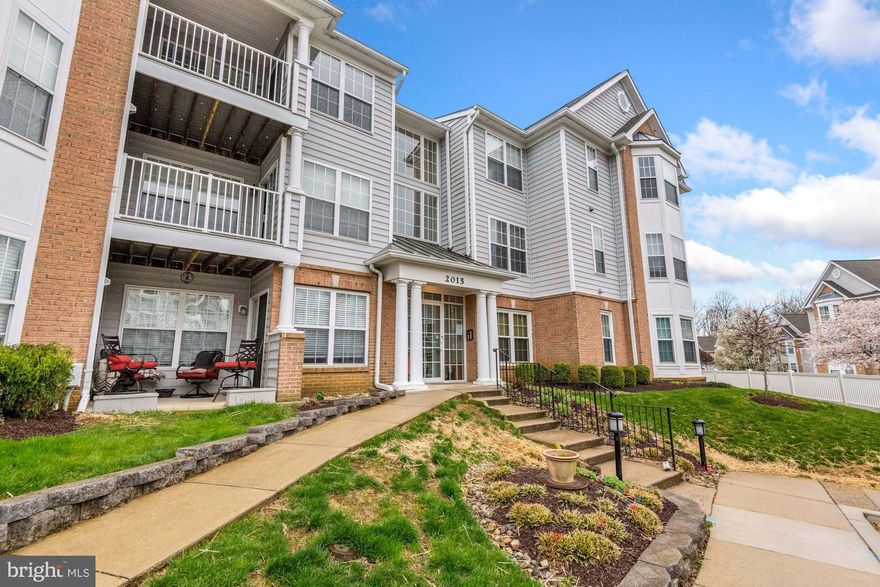 Rarely available 2-bed, 2-bath condo in sought after Tidewater Colony of Annapolis. Enter to grand vaulted ceilings, beautiful hardwood flooring and tons of natural light throughout. Chef's kitchen overlooking family room boasts beautiful wooded cabinetry, two-tier countertops, brand new dishwasher and fridge (2021) and eat-in breakfast area to enjoy your morning coffee or entertain guests. Adjacent dining room with sliding glass door access to private balcony with wooded views is perfect for evening relaxation. Cozy up by the gas fireplace with serene views from the large windows. Owner’s suite offers sitting area, walk in closet and en-suite bath with granite double vanity (2021) and tiled tub/shower. Additional bedroom is perfect for an in-home office or guest bedroom with private full bath. In-unit laundry closet for convenience. Plenty of parking in community plus access to endless amenities including swimming pool, fitness center, Tennis court, playgrounds, walking paths, BBQ/picnic tables, and a clubhouse can be rented for special events. Just minutes to Westfield Mall Annapolis, Whole Foods and Trader Joes. Ideally situated for an easy commute to Rt 50/97 and all that Downtown Annapolis has to offer. Don’t miss this!