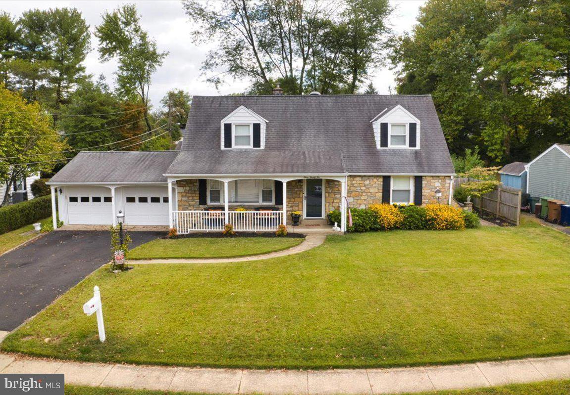 Stunning Stone-Front Cape Cod in Upper Dublin Township. Welcome to this beautifully maintained 4-bedroom, 2-bathroom stone-front single, ideally located in the sought-after East Oreland section of Upper Dublin Township. Combining classic Cape Cod architecture with a thoughtfully designed floor plan, this move-in ready home offers warmth and functionality. As you approach, the covered front porch greets you with timeless curb appeal and offers a peaceful place to sip your morning coffee or enjoy a quiet afternoon with a good book. Step inside to discover a home that exudes comfort and style. The sun-filled living room is both spacious and inviting, offering a perfect space for relaxing or gathering with friends and family. Flowing seamlessly from the living room is the formal dining area, accented with elegant wainscoting that adds a touch of refined sophistication—perfect for hosting intimate dinners or large holiday celebrations. Just beyond the dining room, sliding glass doors lead to a delightful sunporch, filled with natural light and perfect for year-round enjoyment. This serene space offers a great transition to the level, fully fenced backyard, a true highlight of the property. Whether you envision summer barbecues, a garden retreat, or a safe play space for pets and children, this backyard delivers. Best of all, the sunporch provides direct access to the oversized two-car garage, allowing you to move between your car and the house in any weather without ever stepping outside—a convenient bonus! The well-appointed kitchen sits adjacent to the dining area and features granite countertops, gas cooking, stainless steel appliances, an abundance of cabinetry, and a spacious pantry closet. Whether you're a seasoned chef or simply love to cook at home, this kitchen will inspire your culinary creativity. The main level also includes two generous bedrooms, each with double closets, and a beautifully updated full hall bathroom with ceramic tile flooring and surround. Upstairs, you'll find two additional spacious bedrooms, including the current primary suite setup, and a second full bathroom that is equally well-appointed with tiled flooring and ample space for storage and daily routines. The finished lower level offers even more versatility with a cozy family room—ideal as a home office, playroom, or media area—plus a separate laundry and utility area with room for storage. Additional highlights include newer gas heating and central air conditioning, ensuring year-round comfort and efficiency. Located in one of Upper Dublin’s most desirable neighborhoods, this home offers unmatched proximity to regional rail, major highways, shopping centers, dining, several golf courses, parks, and award-winning schools. The location makes commuting and everyday errands a breeze, while still enjoying a peaceful suburban setting. This home truly has it all—charm, space, updates, and location. Don’t miss your opportunity to make this beautiful property your forever home. Schedule your private tour today—this one won’t last!