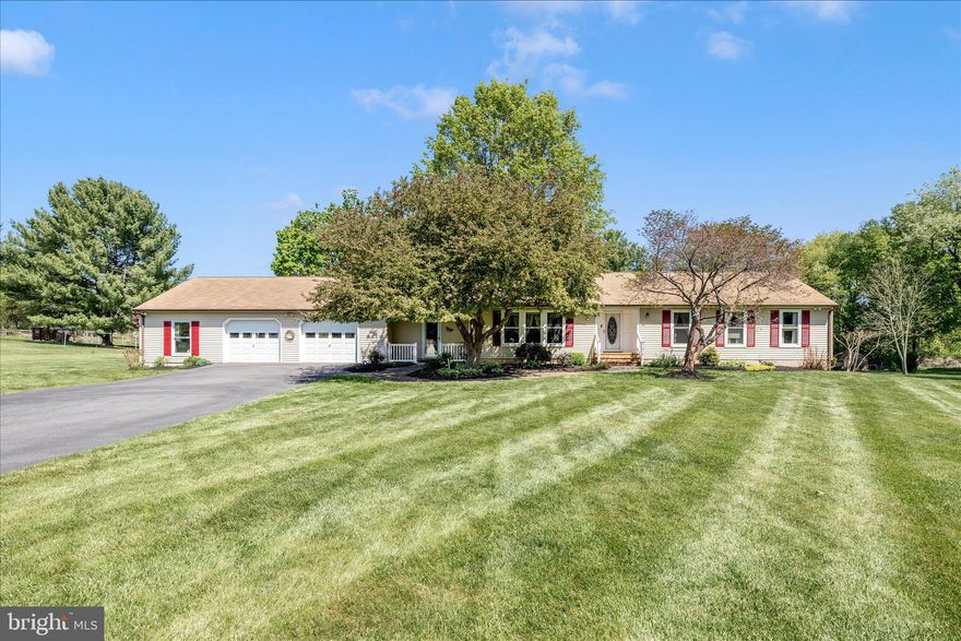 OPEN HOUSE SUNDAY, 4/26, 1-3PM! Professional photos incoming. Welcome to 5910 Lawrence Ct. in Adamstown—a home that perfectly balances comfort, character, and everyday convenience in a peaceful yet central location.

From the moment you arrive, you will appreciate the sense of space and versatility this property offers. Inside, the main level is thoughtfully designed for both daily living and entertaining. The family room just off the kitchen creates a natural gathering space, while the inviting sunroom—complete with a cozy propane fireplace insert—offers year-round enjoyment and abundant natural light. A remodeled and enclosed breezeway with front yard, backyard , garage access and tile floor adds warmth and charm, serving as a unique transitional space full of character.

The living room features a classic wood-burning stove with a beautiful brick surround creating a cozy focal point perfect for cooler evenings. The primary suite provides a private retreat, highlighted by a remodeled bathroom with tub-shower and dual vanity, blending modern updates with comfort and style. Convenient main-level laundry adds to the home’s practical appeal.

The kitchen is equipped with a refrigerator, range, and dishwasher—all under three years old—and the washer and dryer convey, making this home truly move-in ready. A full water filtration system, installed less than a year ago, adds an extra layer of quality and peace of mind.

Downstairs, the basement offers built-in woodworking and crafting tables, making it an ideal space for hobbies, projects, or creative pursuits.

Step outside from the sunroom to enjoy the expansive deck that wraps around the sunroom addition—perfect for entertaining, dining, or simply relaxing. The property includes an 8x12 garden shed for additional storage, and an invisible fence covering approximately two-thirds of the yard. Two pet remote collars and extra batteries are included, providing a seamless setup for pet owners. Multiple flower beds, mature flowering trees, a recently tilled vegetable garden ready for planting, and established blackberry bushes ready to produce in July highlight the private backyard. 

Car enthusiasts or those in need of extra workspace will love the impressive 1,100-square-foot garage, offering exceptional flexibility.

Located in a top-rated school district and set in a quiet yet convenient area, this home delivers a rare combination of tranquility and accessibility.

With its thoughtful updates, inviting living spaces, and standout features, 5910 Lawrence Ct. offers a wonderful opportunity to enjoy comfortable living with room to grow and make it your own.