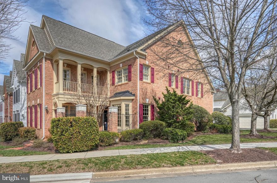 In Fallsgrove, this beautiful all Brick end unit, two story courtyard home, with a two car garage, is filled with custom features and thoughtful upgrades throughout.

Built-ins abound on both upper and lower levels, providing both charm and exceptional functionality. A custom-designed, first floor home office with lots of window offers the perfect space for working remotely. Upstairs the huge master suite offers infinite possibilities and a luxurious, fully renovated primary bathroom creates a true spa-like retreat.

Step outside to enjoy the private rear yard, which includes mature landscaping that has been professionally designed for year-round beauty. The home also features a freshly painted laundry room complete with cabinetry and a utility for added convenience.

The inviting front courtyard, which also includes mature landscaping has been professionally designed for year-round beauty, is finished in classic brick, and overlooks beautifully landscaped common area-perfect for relaxing or entertaining.

Ideally located within walking distance to the neighborhood Safeway anchored shopping center, the community pool, clubhouse, and The Thomas Community Center, this home offers the perfect blend of comfort, style and convenience.