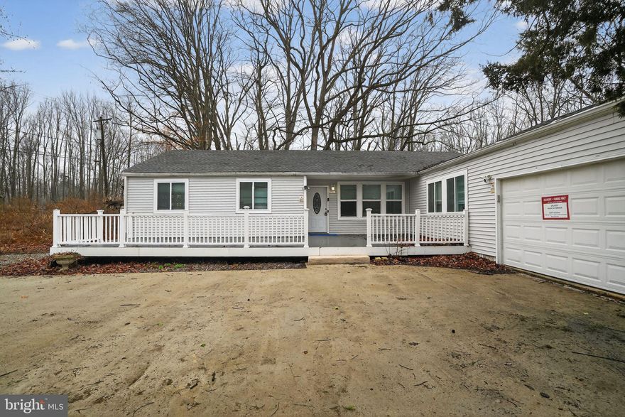 BEST VALUE in Newark! 3 bed / 2 full bath spacious open layout floor plan;  living room, family room and sunken sunroom attached two car garage, 2 composite decks overlooking a generous 1 acre lot.  Excellent rental producing home property could be subdivided.  Located just 2 miles from Newark Charter School and in close proximity to the University of Delaware and Newark Train Station, this home offers both convenience and value. *Home Digitally Staged