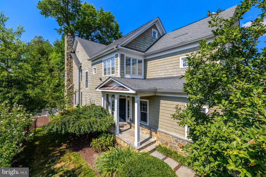 Beautiful and bright Buchanan-Price home on a ¼ acre in West McLean, with 4BD|3.5BA and over 3,500 sq ft of living space on three floors. Open floor plan w/hardwood floors on the main level. The large living and dining rooms, with crown molding and wainscotting, are drenched in sunlight from oversized windows overlooking the side yard. The spacious eat-in kitchen has a large center island and opens to the cozy family room with a stone fireplace and allows direct access to the deck and back yard. The upper level has 4 bedrooms and 2 bathrooms, including the primary bedroom with vaulted ceiling, dual walk-in closets and a spacious bathroom with soaking tub, separate shower with new frameless glass door, private water closet and dual-sink vanity. The fully finished lower level with full bath, has a large rec room with stone fireplace and a flex room, ideal for a home office, playroom, guest room or gym and plenty of additional storage space. 

The newly-built deck is perfect for dining al fresco and the large, usable yard is fully fenced - ideal for a playset, trampoline, playing ball or creating a beautiful flower and vegetable garden! McLean High School pyramid. Generac whole house generator, HVAC - 2020. Public water and sewer. Minutes to downtown McLean, Silver Line Metro, Lewinsville Park, Tuckahoe Recreation Club and McLean Swim and Tennis Club, Tysons Corner and major commuter routes.