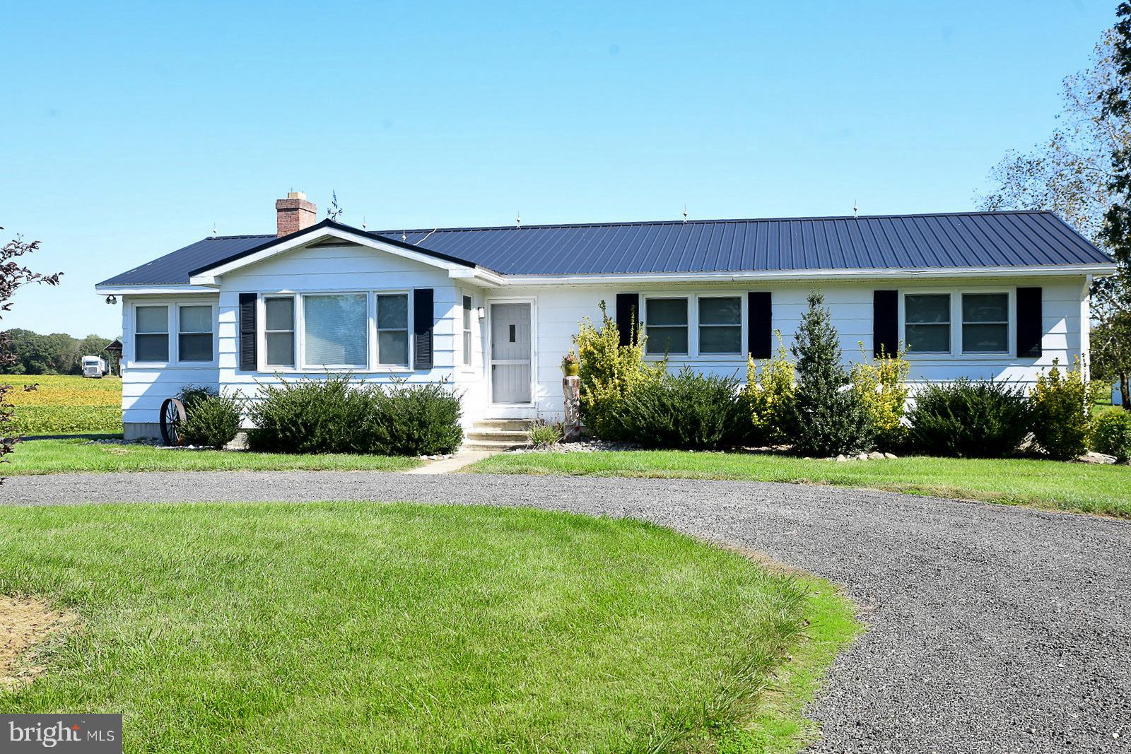 Experience country living at its finest in this expansive rambler, nestled amidst picturesque farmlands. This charming home offers three generously sized bedrooms and one well-appointed bathroom, epitomizing the timeless appeal of rural living. Rich hardwood floors flow seamlessly throughout the entire residence, adding warmth and character.
Each bedroom is designed for comfort, offering plenty of space to unwind. The enclosed porch serves as a versatile room—ideal for a play area, study, or additional storage space. A detached garage ensures your vehicle remains shielded from the elements, while oil heating guarantees you stay cozy during those crisp, wintry evenings.
The property boasts ample yard space, both in the front and rear, perfect for outdoor enjoyment. Embrace the convenience of local produce and crafts, all just a stone’s throw away. Surrounded by expansive agricultural fields, this home is also within close proximity to fresh, locally sourced meats and produce.
Enjoy the serene rhythm of horse and buggy traffic within this welcoming community, and take advantage of the open space for recreational vehicles or boats. Best of all, there's no HOA to contend with, allowing you to fully enjoy your property as you wish.