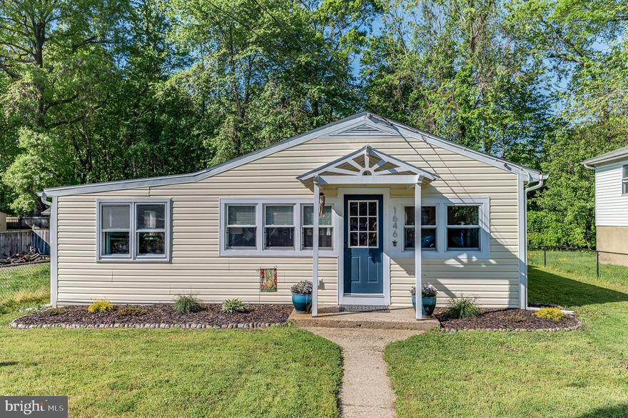 Well, Hello! I have been waiting just for you! It is time to bring your boxes, joy, and laughter into this home!I might appear to be just a cute one-level, but really, I am a bit of a looker if I do say so myself. The Master bedroom has a dual-vanity en-suite bathroom and walk-in closet. With two additional bedrooms, an additional full bath, and an open floor plan, I can t wait for you to fall for my contemporary charm. You will get plenty of natural light throughout the home, and my neutral d cor is just waiting for your flair. I have also been busy getting primped for our first meeting. Come check out the updates like roofing, heat pump, water softener, and kitchen backsplash. Pull up a stool to the kitchen counter or set your table right next to it for multiple dining options. My stainless-steel appliances and granite countertop reflect even more of that natural light I was mentioning, and the open kitchen allows you to interact with guests (from 6 feet away!) while you make your favorite dishes on the glass-top stove. Speaking of kitchen-- the sliding door gives you easy access to the fenced back yard for lounging in the sun or doing low-maintenance yardwork to keep your mind off the social distancing in the meantime.Have you looked down yet? I don t want to brag, but these wood-look vinyl floors are not only beautiful, but they re easy to care for and they ll go with whatever style you bring in. Because I know you like convenience, I am close to major highways to get you where you need to go. And where DO you want to go? There are so many nearby options available! One of my favorite character traits is that I am close to water activities, historical riches, shopping, restaurants, nature, and more.  Am I rambling on? Okay, enough about me this is about YOU and what you would like to do. How about some of these options:Rent a boat or charter at Rob Wagner Charters or South River Boat Rentals; walk around Annapolis for a major dose in U.S. Naval history; take a ferry around the harbor; visit Historic London Town Gardens or Smithsonian Environmental Research Center; hit the beach parks of Beverly Triton or Mayo; bring Fido to the dog park or take advantage of over 300 running routes in the area. Oh! And the food! You can still support local businesses and get take-out from some awesome eateries as you unpack and settle into the neighborhood. Rise Up Coffee will get your day started with a great cup of latte and some light fare. Later, get your fill of seafood, ethnic, and American cuisines from Yellowfin Steak & Fish House, Nova, Saigon Palace, M Thai Kitchen, Hispa Restaurant, Angelina s Italian Kitchen, Panda Noodle House, Waterman s Tavern, Coopers Tavern, and so many others. Okay, enough teasing it is time for you to come see me! Hurry!
