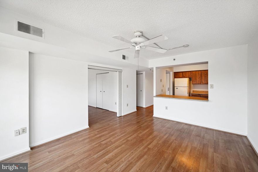 This wonderful condo has the lowest condo fee of any currently for sale in all of Leisure World!  One bedroom plus a den which could be used as another bedroom.  One and a half bathrooms.  Large walk-in closet in bedroom.  Freshly painted!  Laundry in the unit!  Building has an elevator, no need to do any steps.   Amenities at Leisure World include a shuttle system, an art studio, a wood shop, a ceramics studio, a game room, two restaurants, golf course, tennis courts, indoor and outdoor pools, an on-site post office, medical center and much more! Leisure World Plaza, with a supermarket and shops and restaurants, is located right outside the gates of Leisure World. Metrobus picks up right on campus and Glenmont Metro (red line) is 10 minutes away.  Selling as-is.