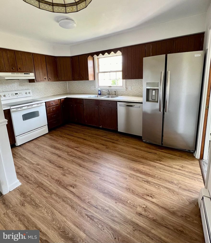 Spacious three bedroom,  two bath apartment with in-unit laundry. Landlord provides heat, hot water, trash, onsite water and sewer. Tenant pays electric and cable/internet. Two car off street parking.  Pets at landlord's discretion. Rural setting, close to town,  directly across from Green Lane Park amenities.