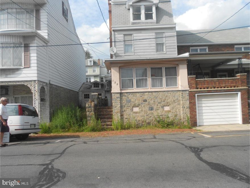 Large row home.  Great for an investment property or with some work, could be a great home. Home being sold in "AS IS" condition.