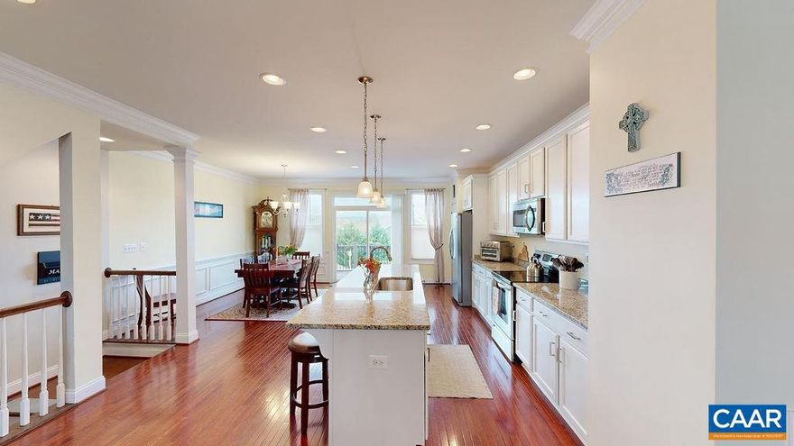 180PANORAMIC MOUNTAIN VIEW townhome in the Heart of Albemarle.  Walk into the foyer, where you have a half bath, 2-car garage and bonus room great for a bar, office or playroom.  Possibilities are endless.  Walk upstairs to a beautiful open kitchen, dining and living room that offers dark floors, gourmet kitchen w/pantry and lots of natural light, including half bath.   Off the kitchen is a trek deck with privacy panels.  Enjoy the 180 degrees of mountain views and colorful leaves on the tree tops in the distance.  Next level offers the same hardwood floors on the large landing. Primary bedroom and bath, with 2 additional bedrooms that accommodates queen size beds, with the laundry room.     Top level offers the 4th bedroom/bonus room with mini split.  Don't forget the ROOF TOP TERRACE, which offers another level of mountain views and starry nights.  Ting Internet is now available.,Granite Counter